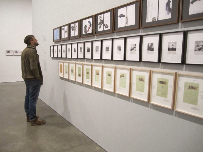 My husband checking out the Walid Raad exhibit