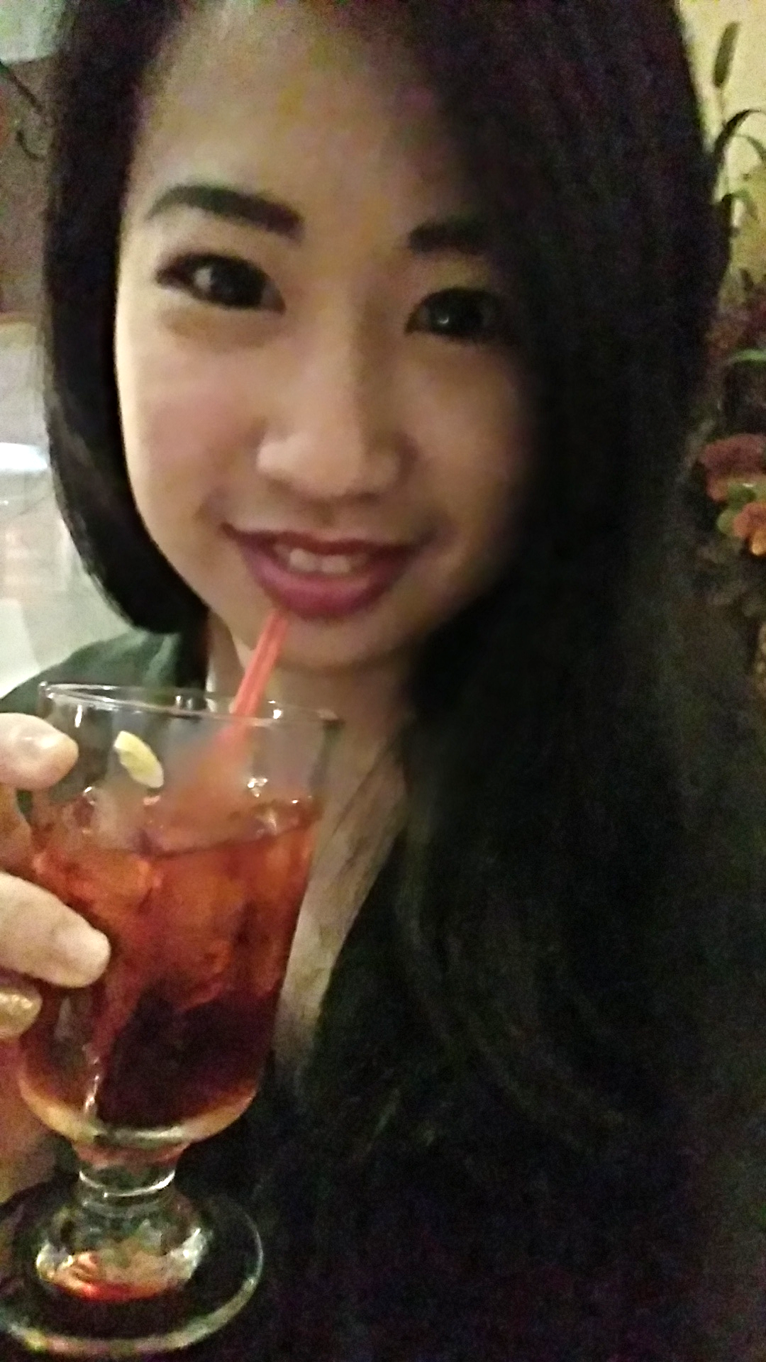 Zerlinda enjoying a Negroni, her favourite cocktail, in a NYC restaurant.