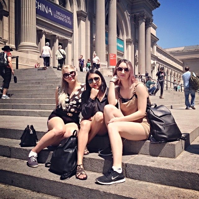 Olivia, Jessica, and Michelle on the steps of the Metropolitan Museum of Art.