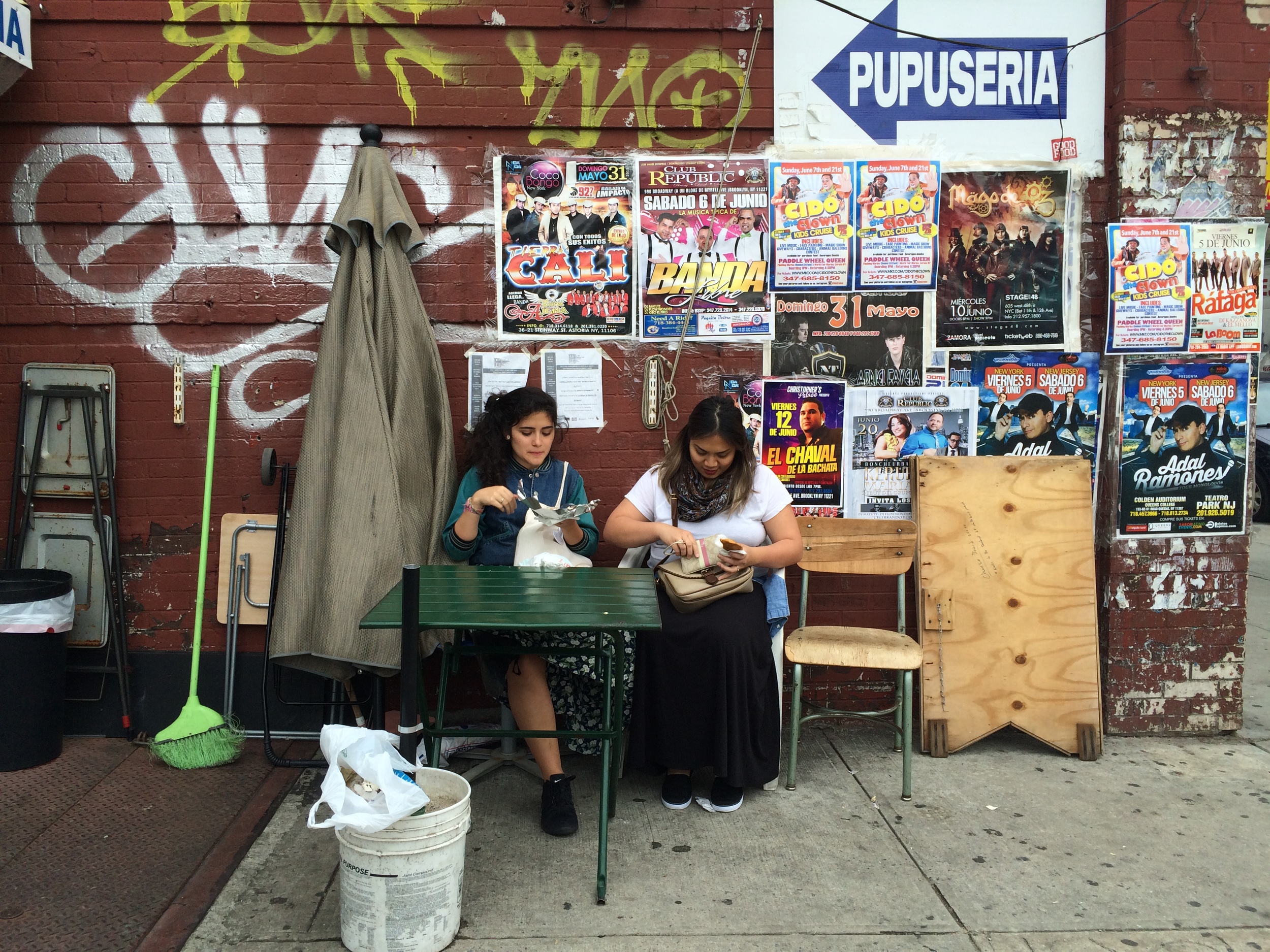 Andi and Pauline enjoying Salvadorean food on the streets of Bushwick in Brooklyn.