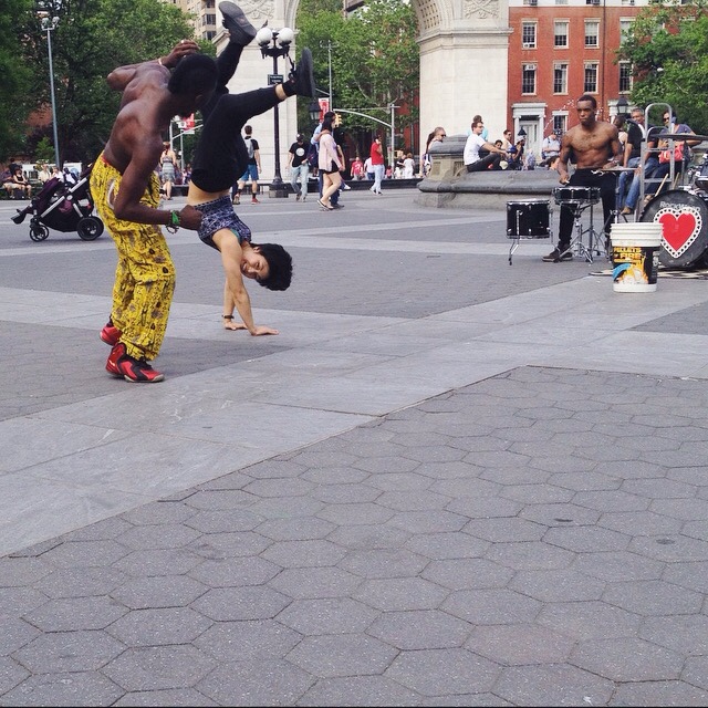 Street dancers and musicians at Washington Square Park.
