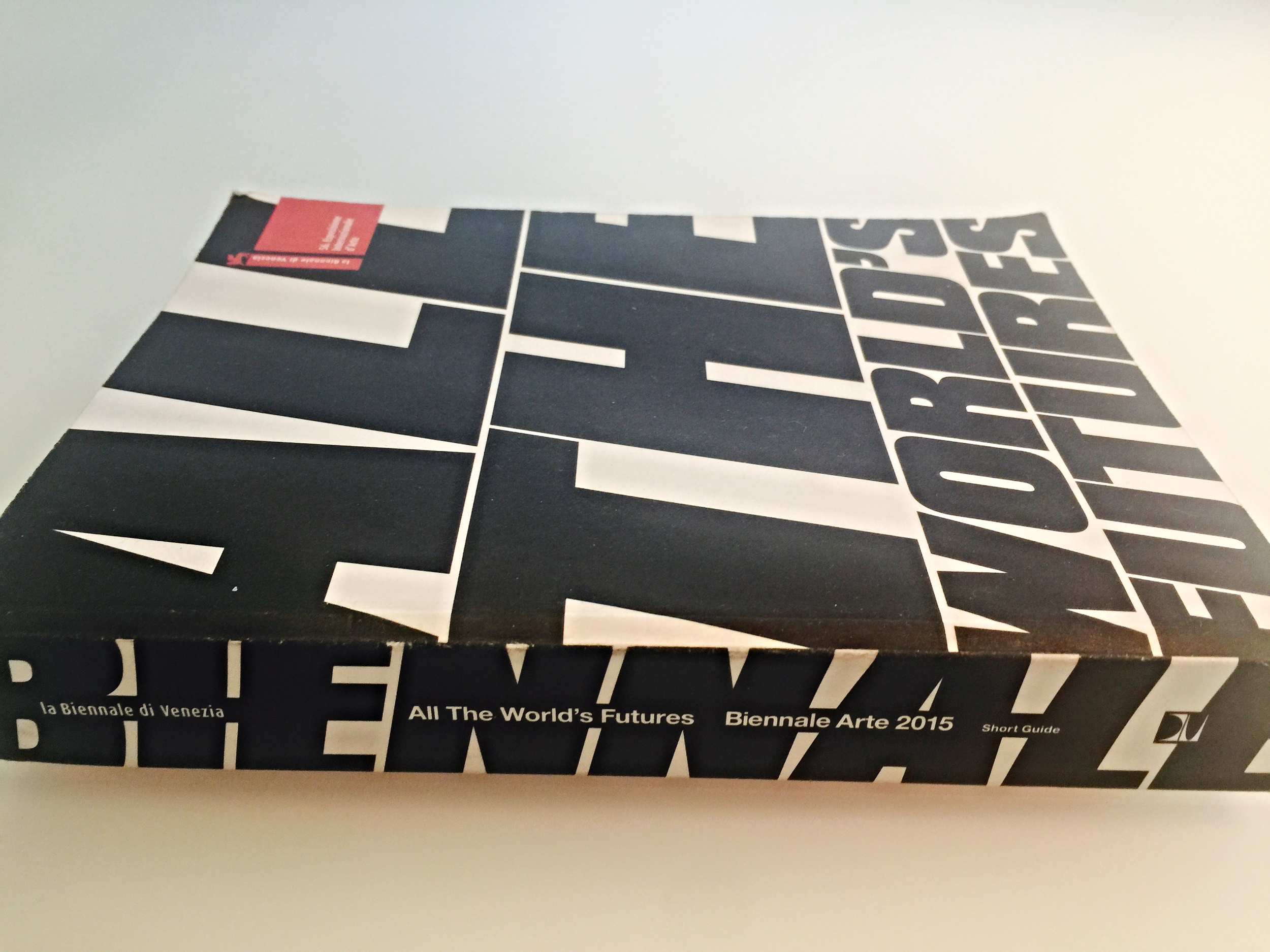 The compact catalogue for the 2015 Venice Biennale with this year's theme "All the World's Futures" logo on the cover.