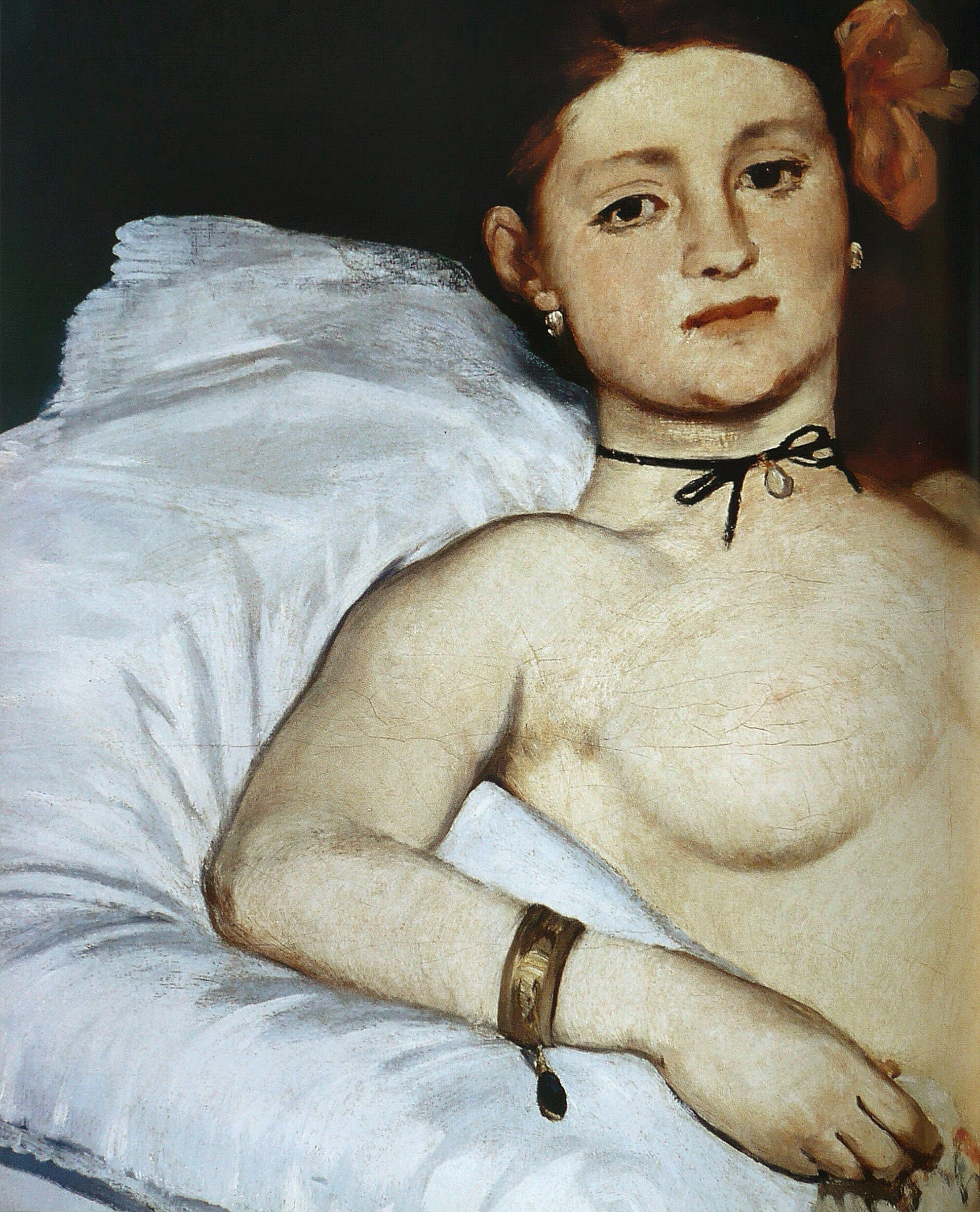 Note the details of a painting-- here we see Olympia wearing expensive gold jewellery.