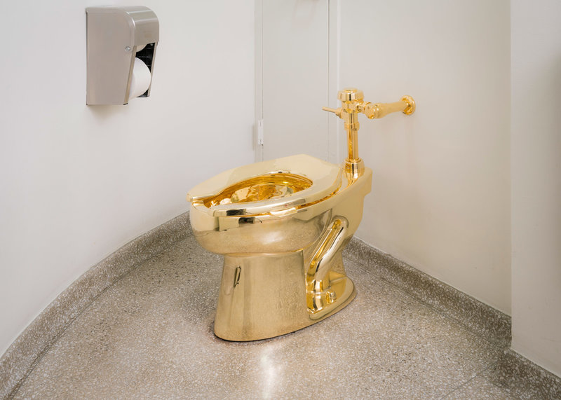 "Behold The Throne: There's A Golden Toilet At The Guggenheim"