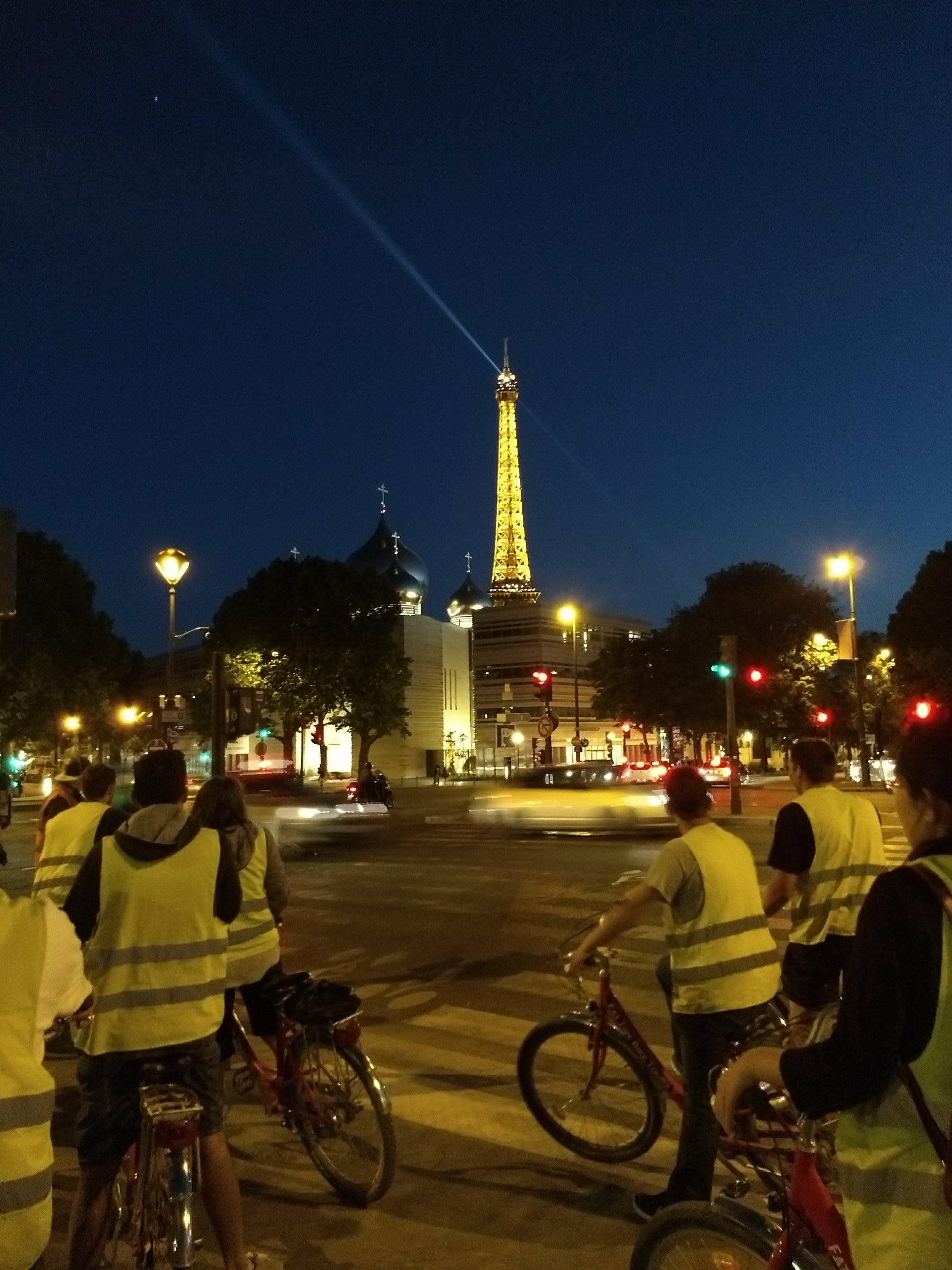 Enjoying the twinkly lights on the Eiffel Tower at the end of the bike tour.