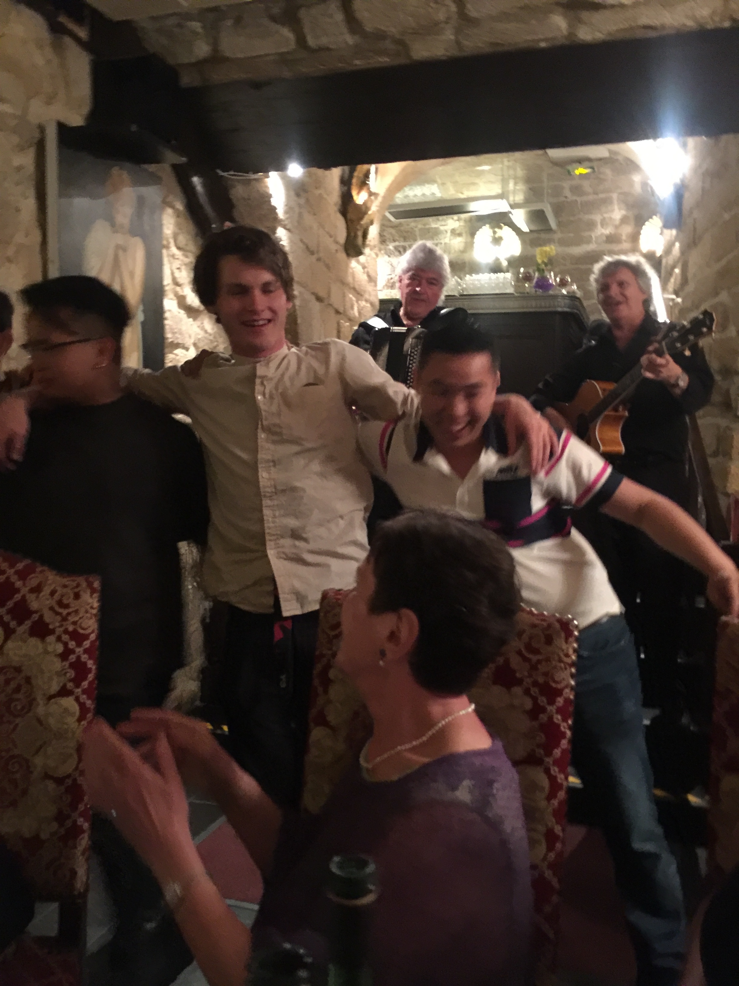 Nielsen having a great time dancing at the group dinner in the Latin Quarter of Paris.