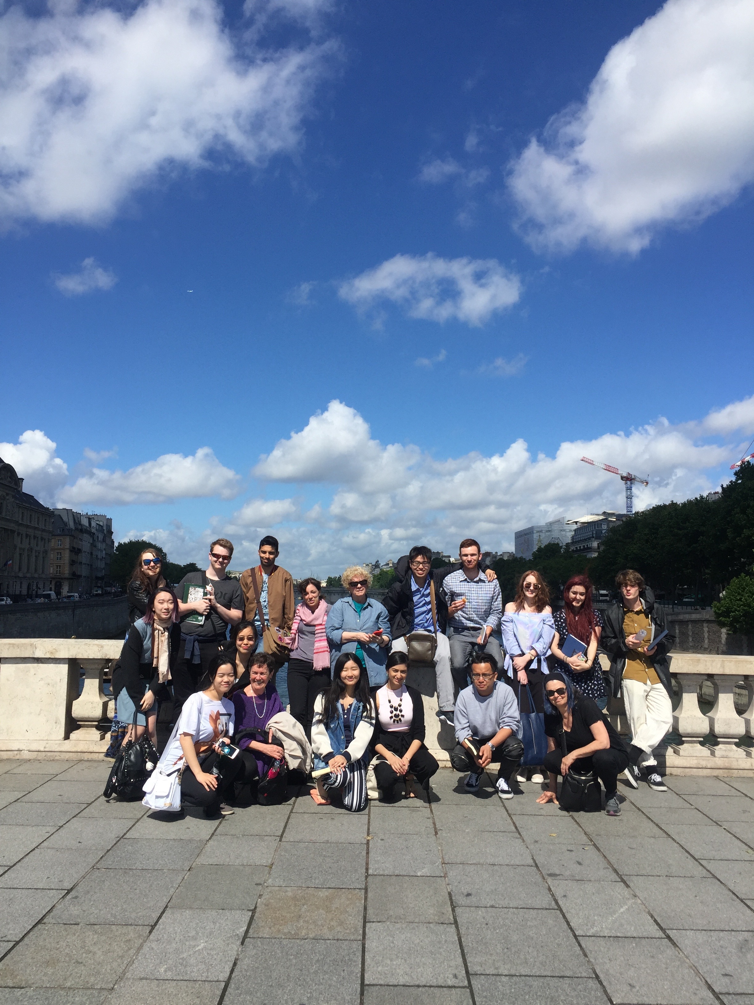 Group photograph on one of the many bridges of Paris-- Lukas on the far right.