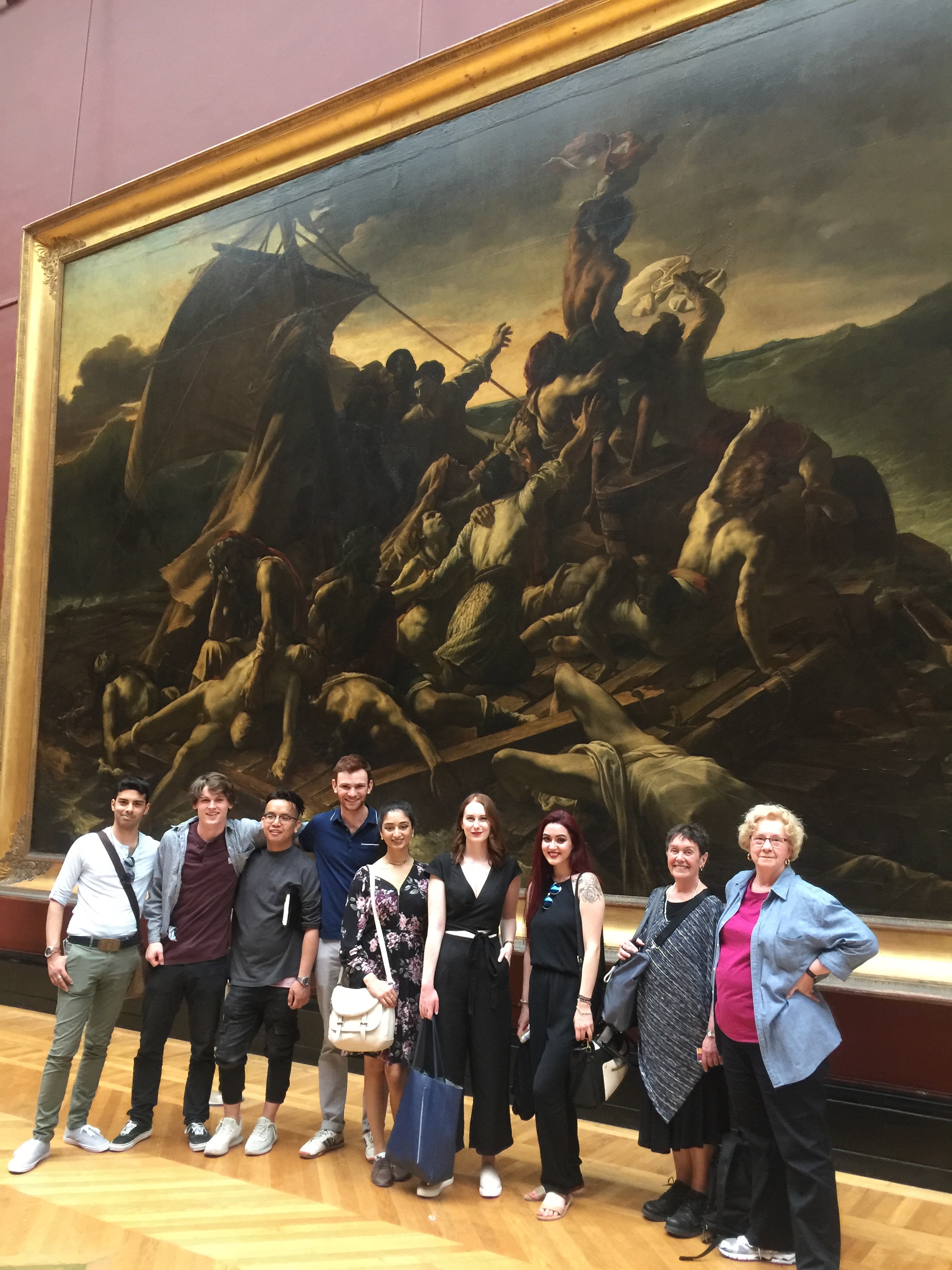 Back in Paris at the Louvre Museum, Stephane (at far left) poses with field school students in front of Gericault's Raft of the Medusa (1818-19).