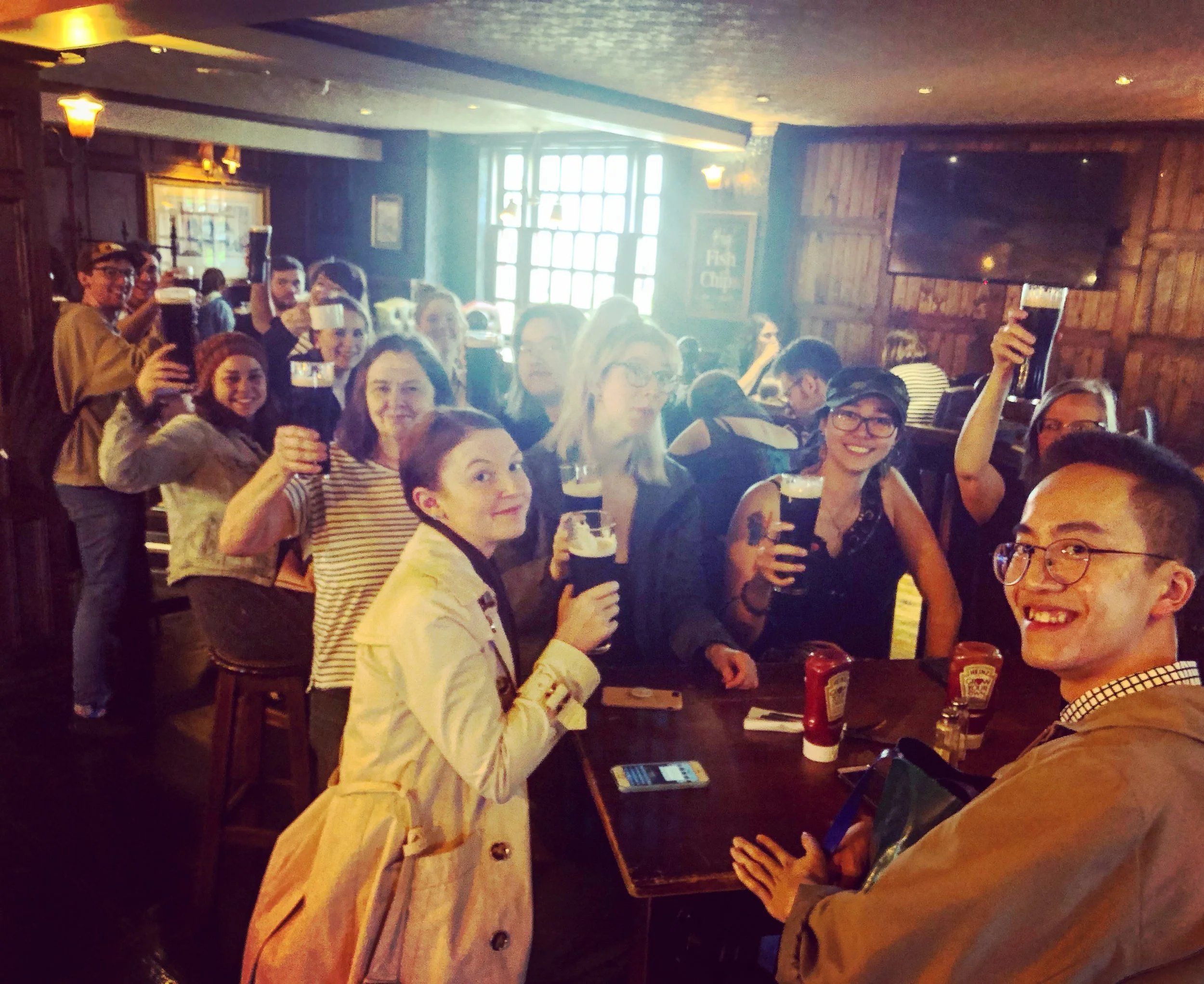 Ronald, far right, enjoying pints with the group at The Anchor, 800 year old English pub on the banks of the Thames