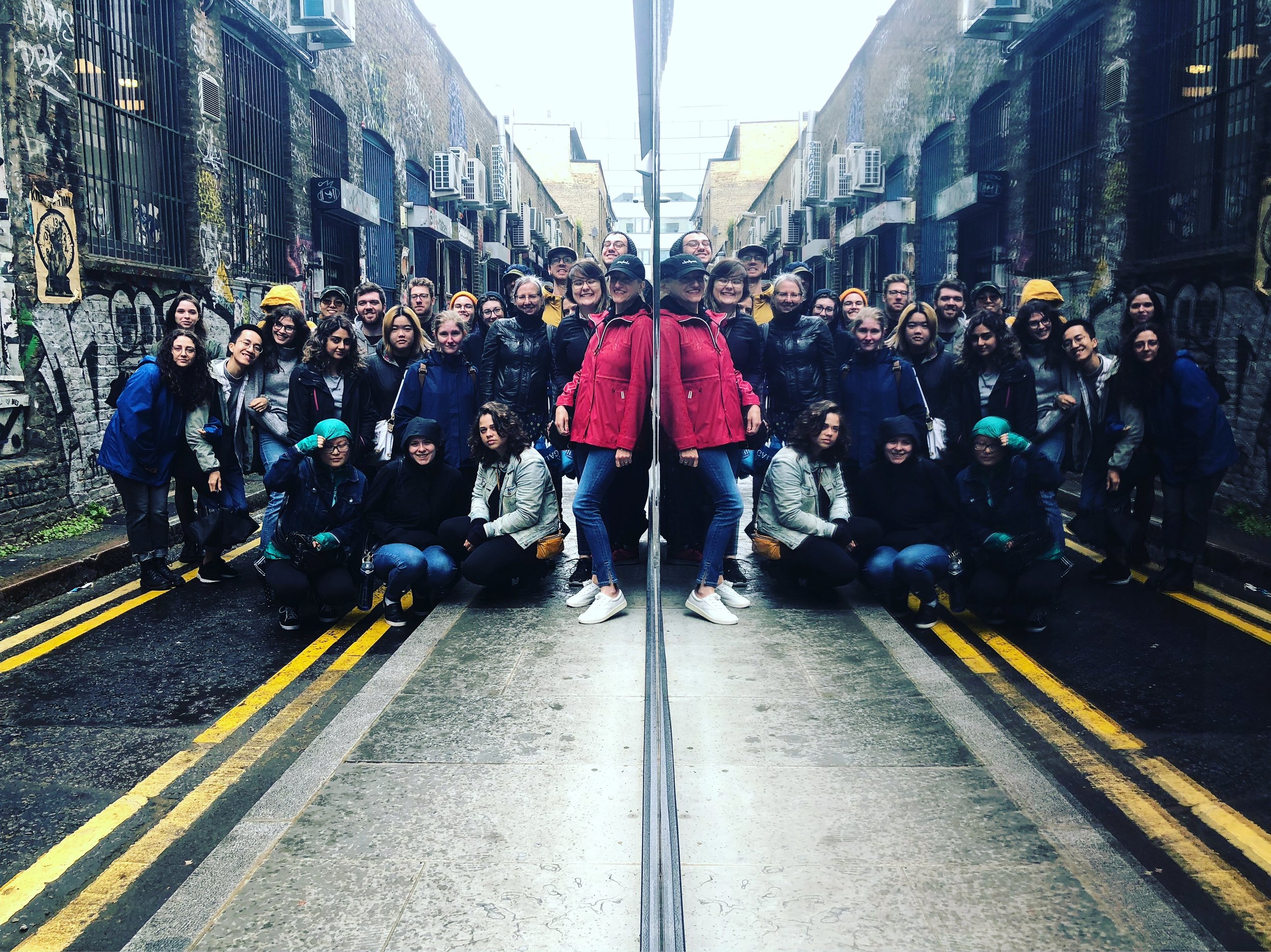Group photo while on the Shoreditch street art tour. Adam can be seen peeking above us all as the very tallest student at the top right of the image.