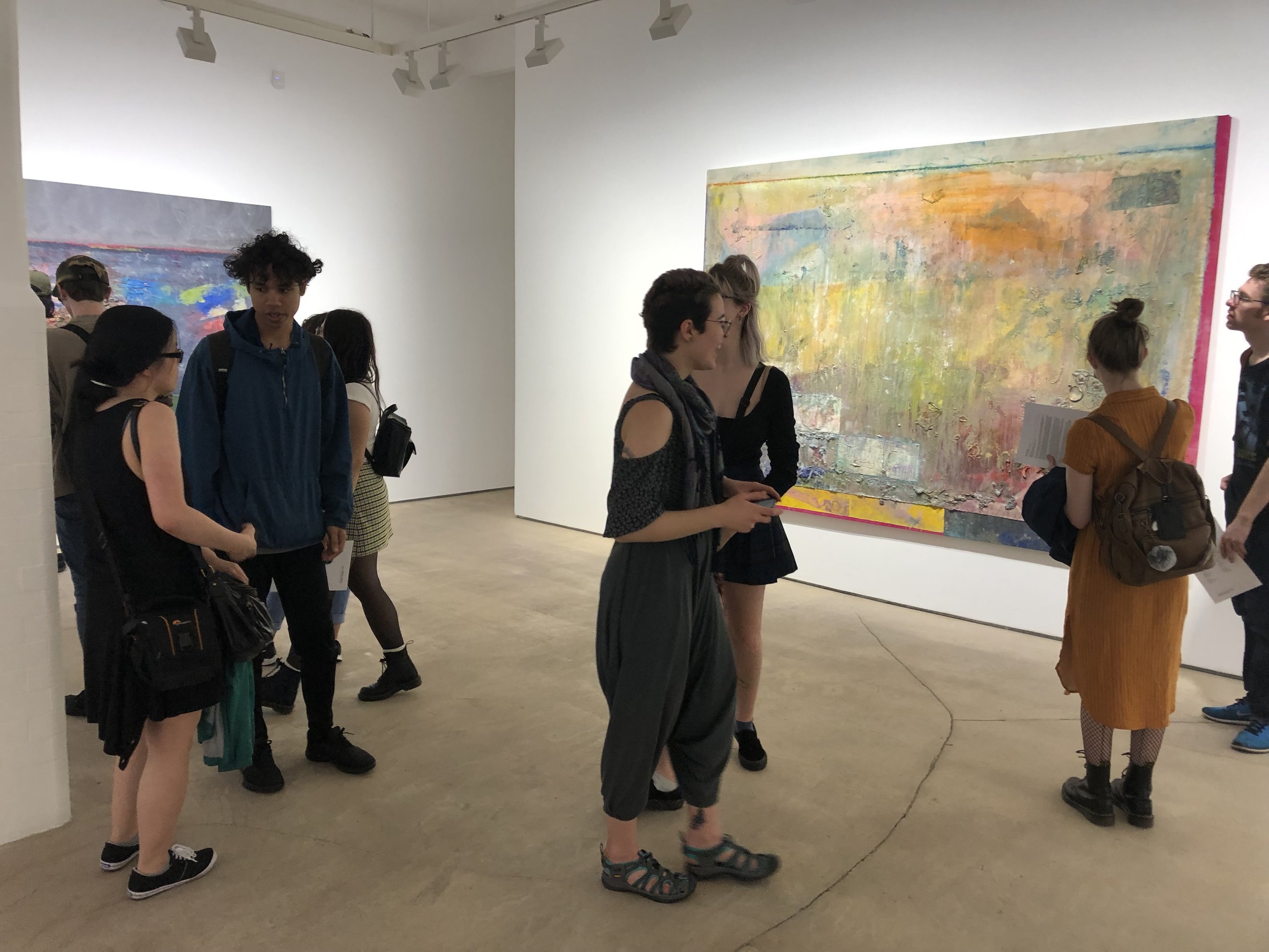James, second from left, is nearing the end of his BFA program and is shown here visiting one the many small galleries in Londonâs Shoreditch neighbourhood.
