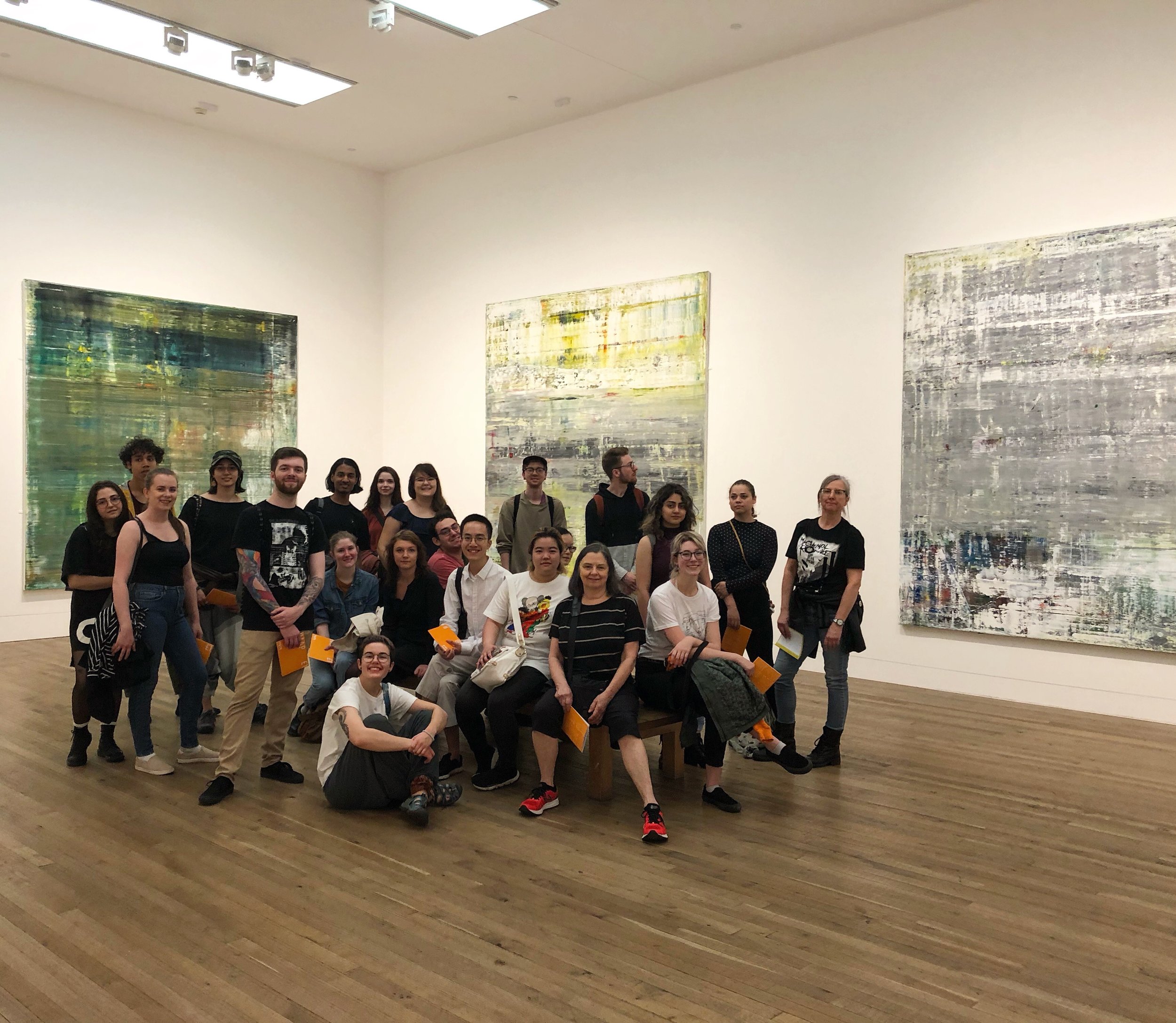 Elizabeth, fifth from right, posing with the group in the Gerhard Richter room at the Tate Modern