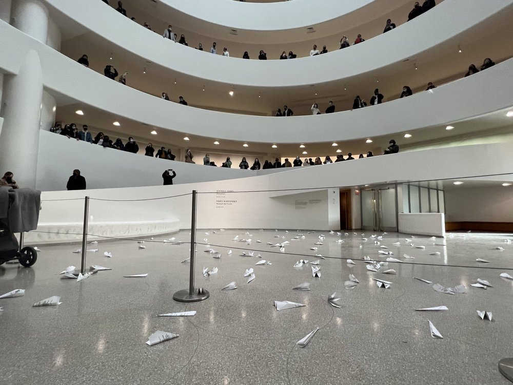 "Calling For “No-Fly Zone” Over Ukraine, Artists Launch Hundreds of Paper Planes at Guggenheim Museum"