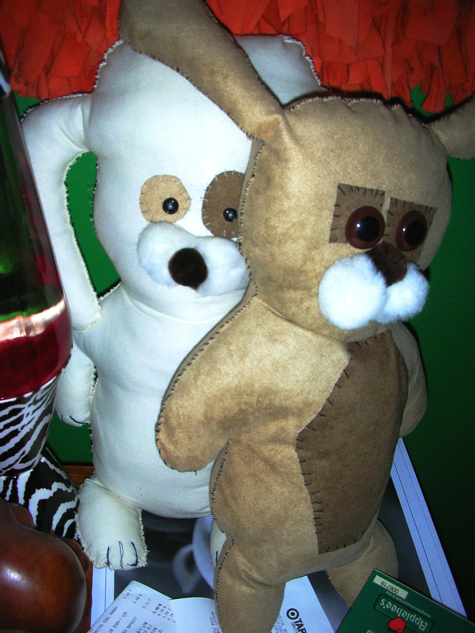  Hand sewn buddies by Always Strange, made as Christmas presents for family. Both are made from extra faux suede fabric initially intended for a couch reupholstering project that never took off. Both creatures currently live in Syracuse, NY. 