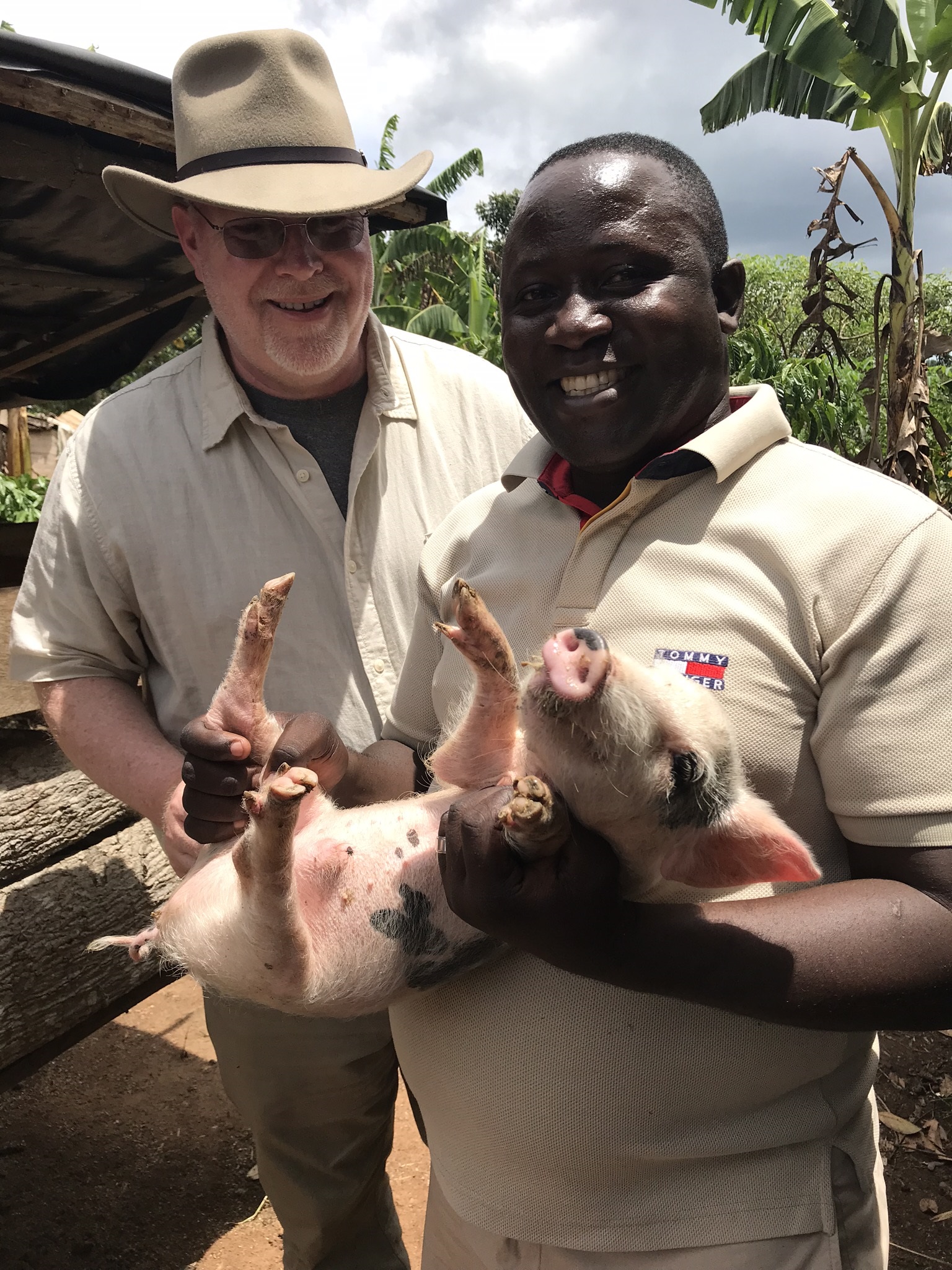 Fr. Paul and pig.jpg