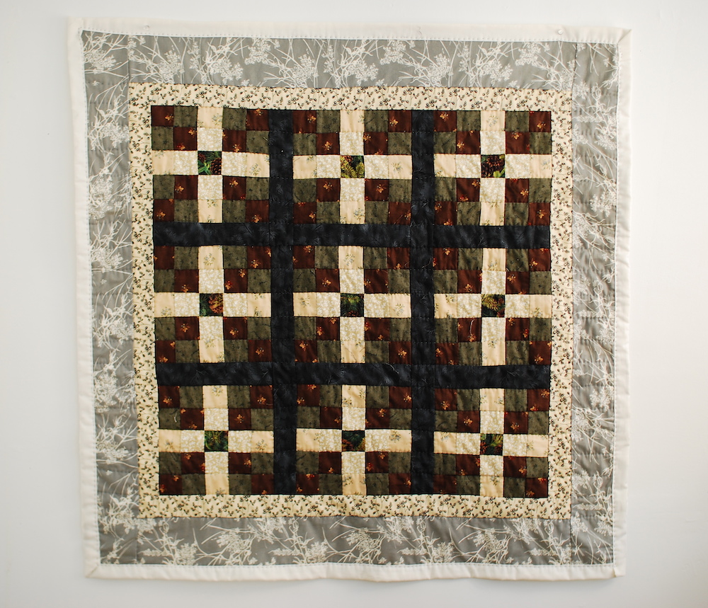   Raccoon Kit Quilt,  (before animal contact), hand stitched quilting cotton, 2010 