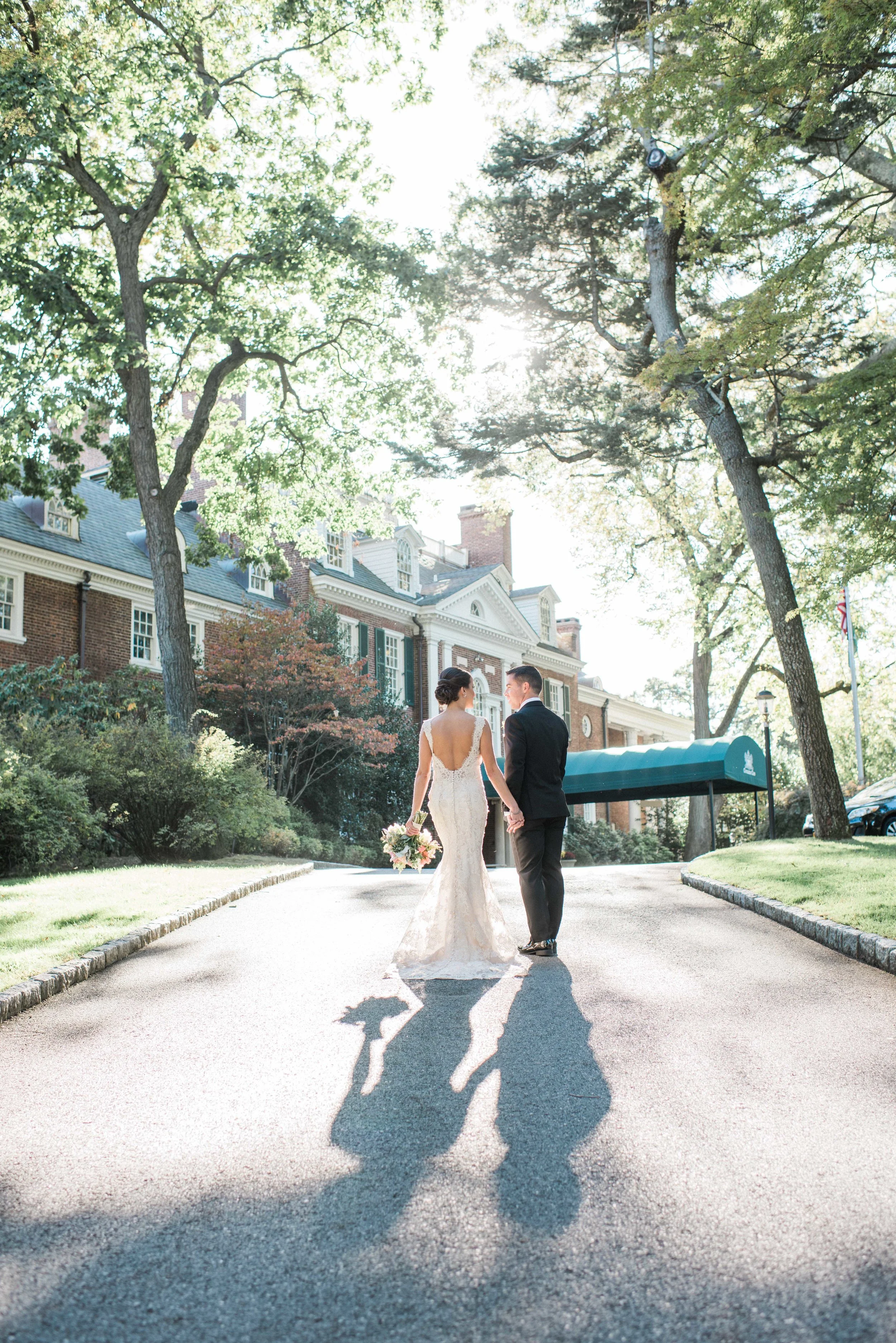 Country Club Wedding, Coveleigh Club Wedding, Rye, New York Wedding, Rye Wedding, Long Island Wedding Photographer, New York Wedding Photographer, New Jersey Wedding Photographer, Hudson Valley Wedding Photographer, Fine Art Wedding Photographer, Destination Wedding Photographer, Connecticut Wedding Photographer, Natural Light Photographer, Bride and groom walking, Stunning image of bride and groom, good looking bride and groom, wedding day photos, bride and groom portrait