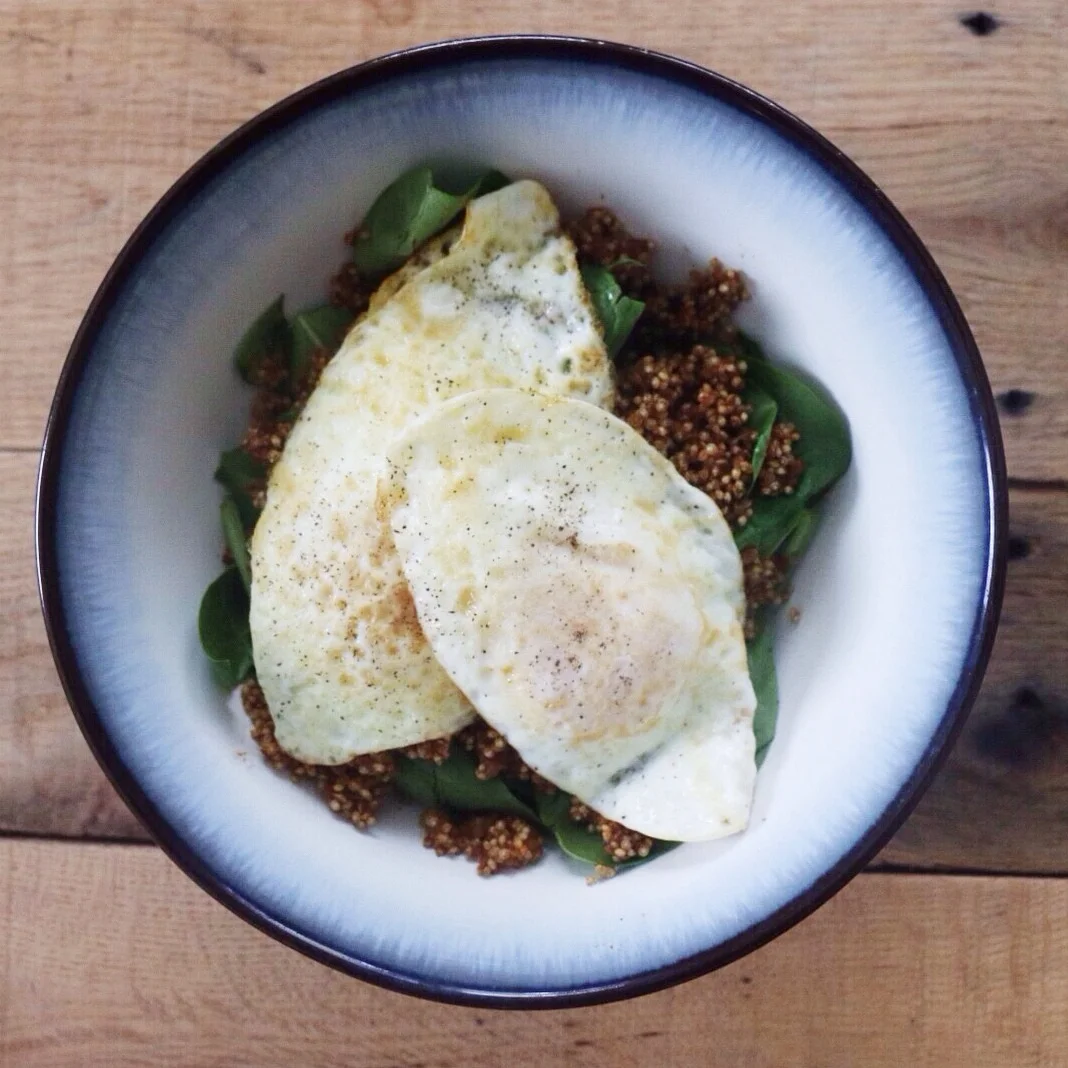 Spinach, quinoa & black beans, fried eggs 