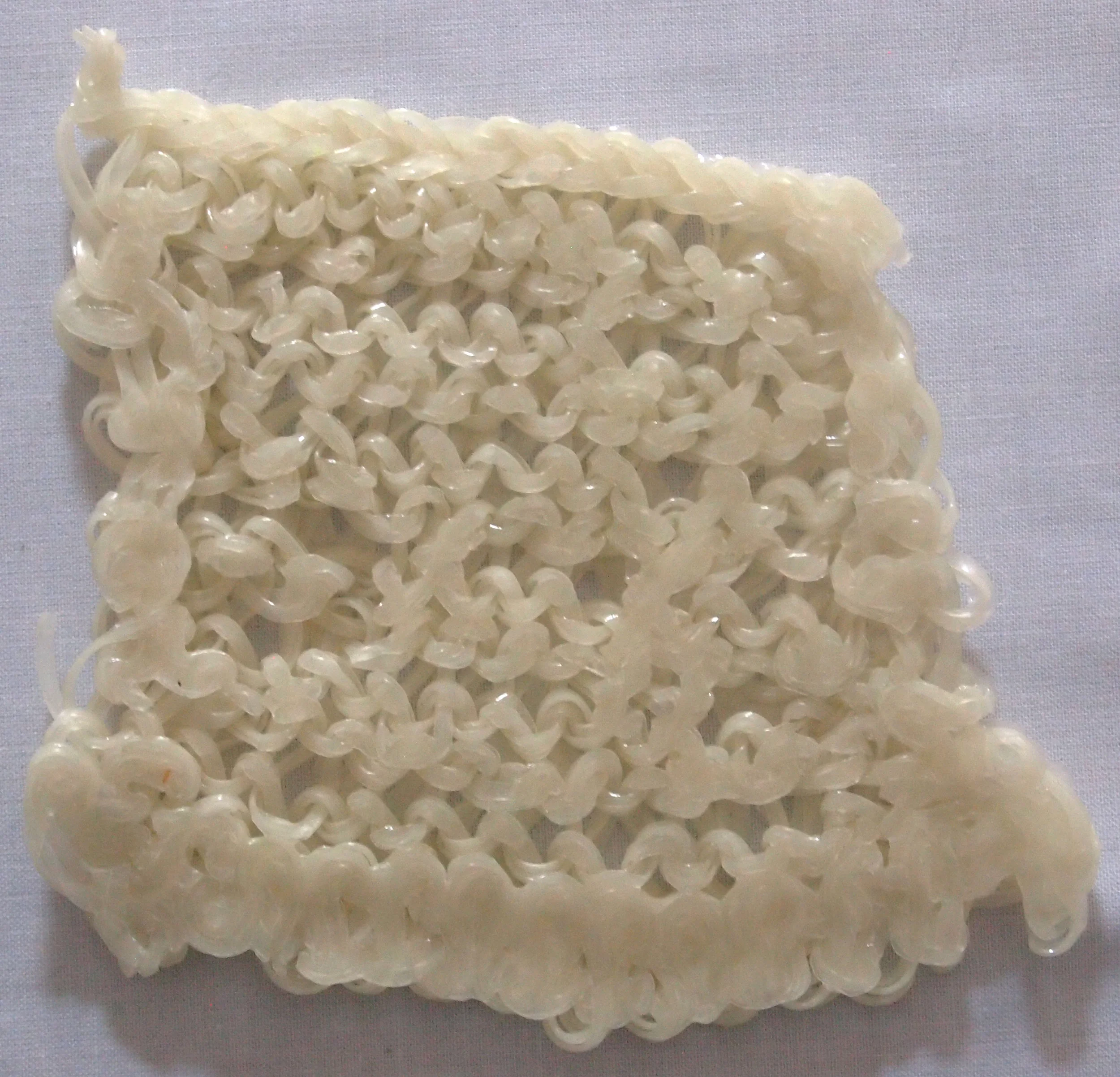 Hand Knit (And Heat Pressed) Glow-in-the-dark Plastic Lacing