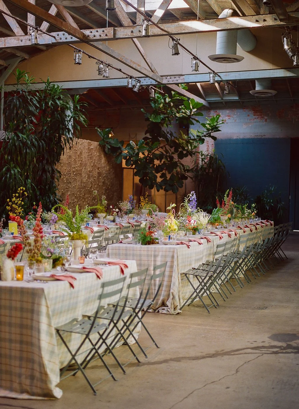 eclectic-reception-table-flowers-modern-wedding.jpg