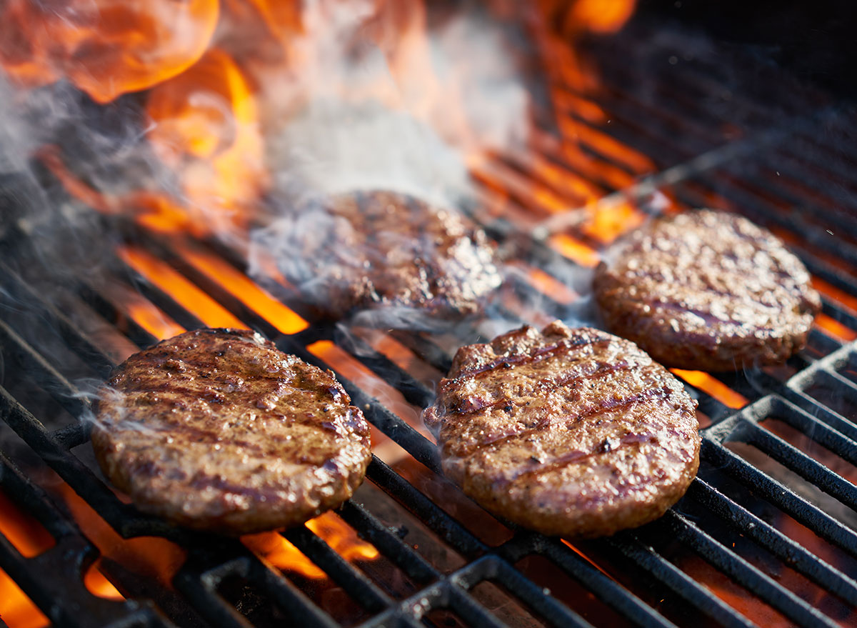 burger-patties-on-grill-in-flames.jpg