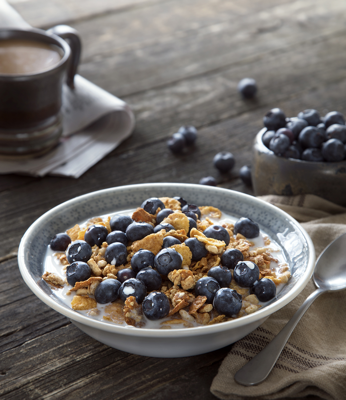 food photography of cereal and blueberries