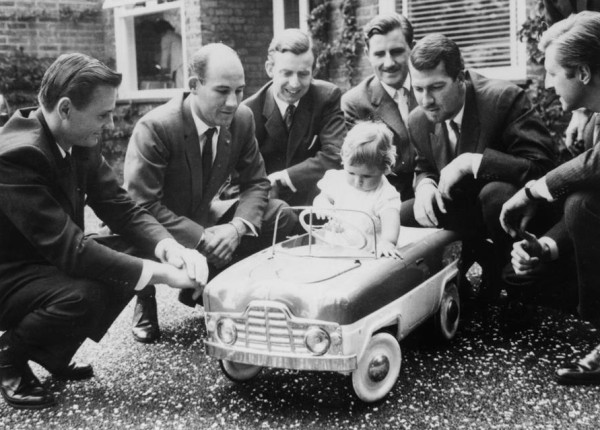 Left to right: Bruce McLaren, Stirling Moss, Tony Brooks, baby Damon Hill, Graham Hill, Jo Bonnier, Wolfgang von Trips photo: Keystone, Getty Images