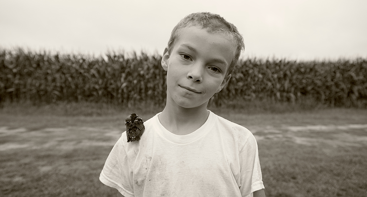 The boy and his bird, near Accomack, Virginia