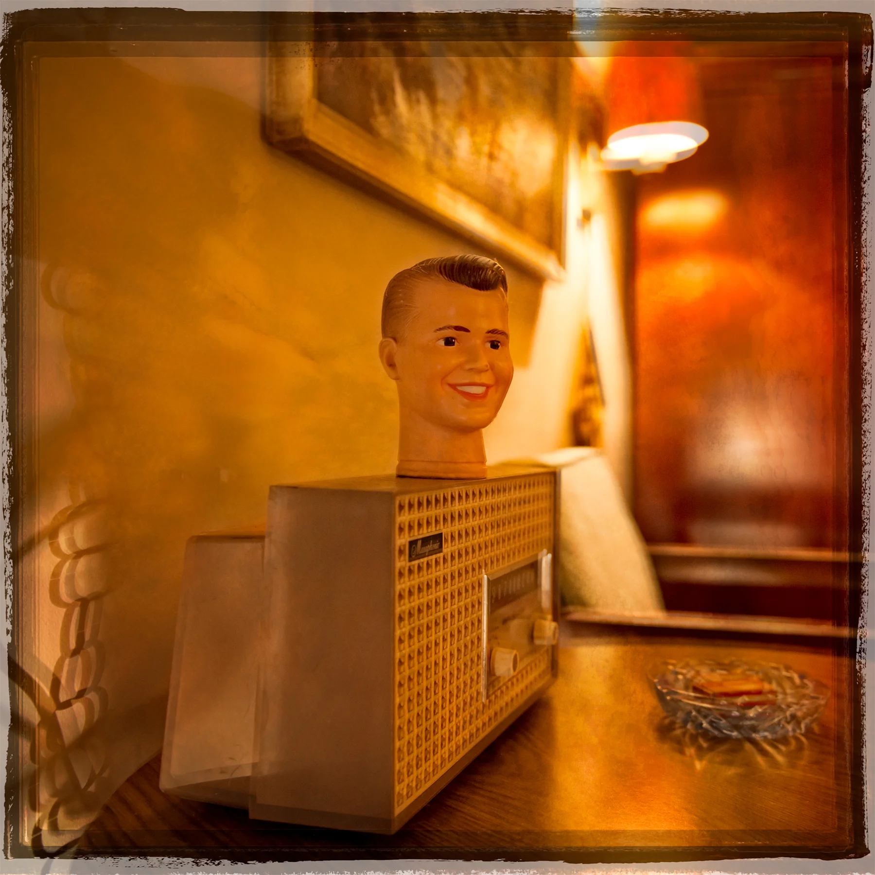 Hotel Room with Doll Head Bust, off Military Highway