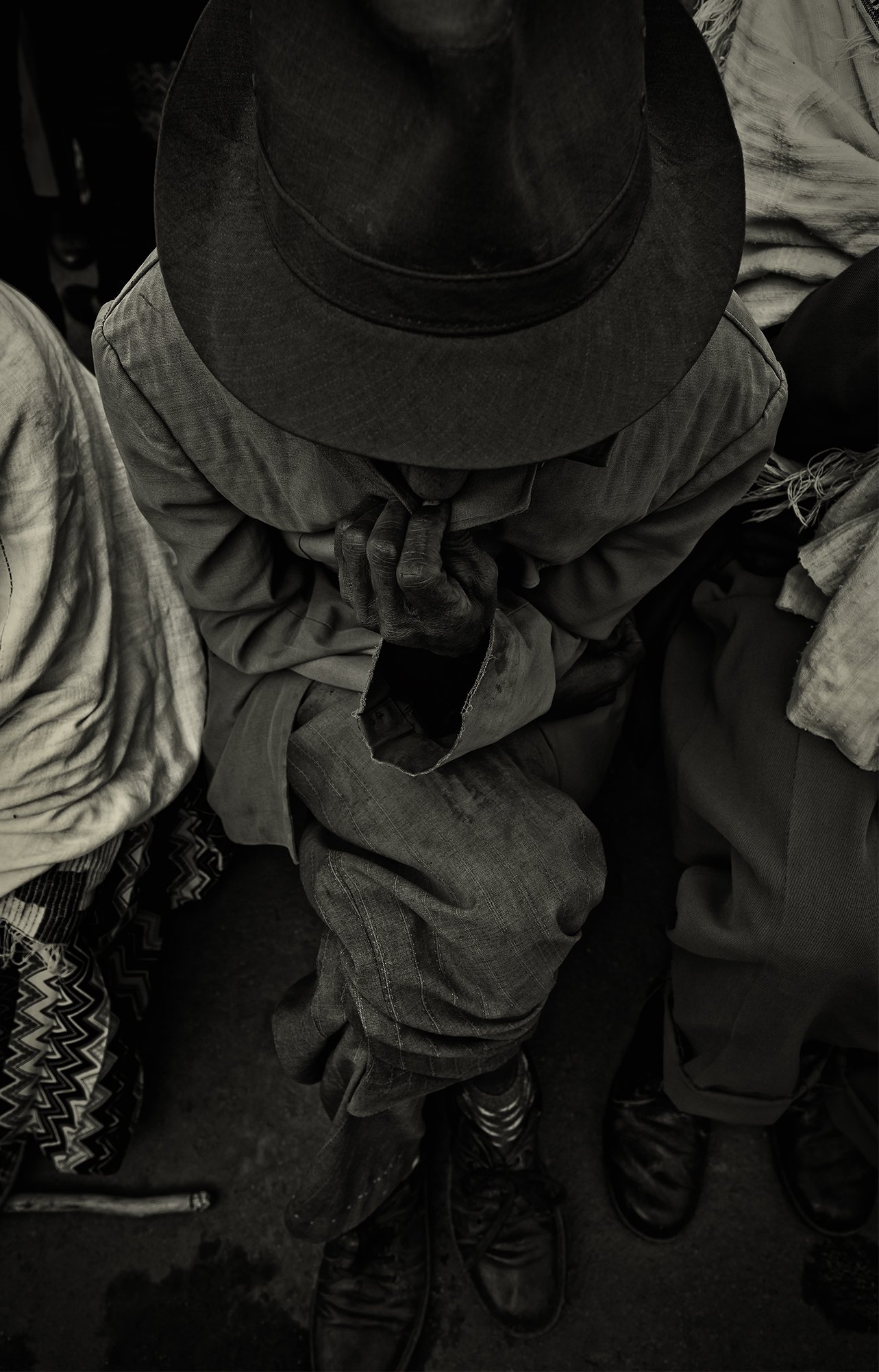 Man in a hat waiting, Ethiopia 