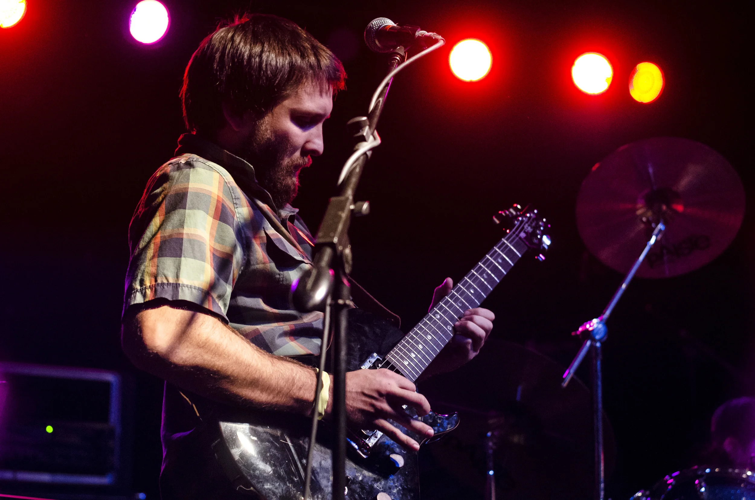 Beyond I Sight guitarist Jeremy Santizo leans back during a solo