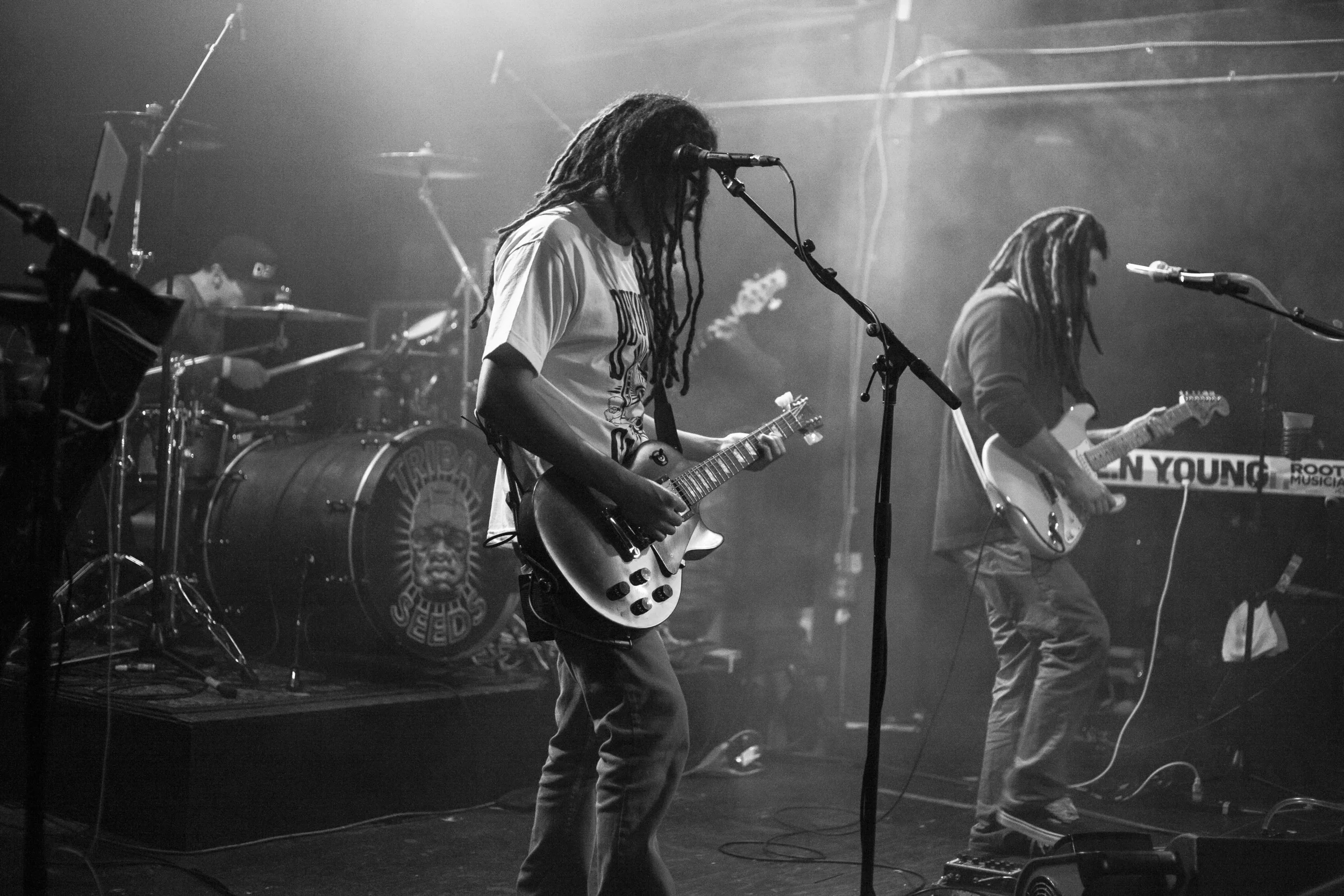 Steven Jacobo glances at his guitar during Tribal Seeds' set