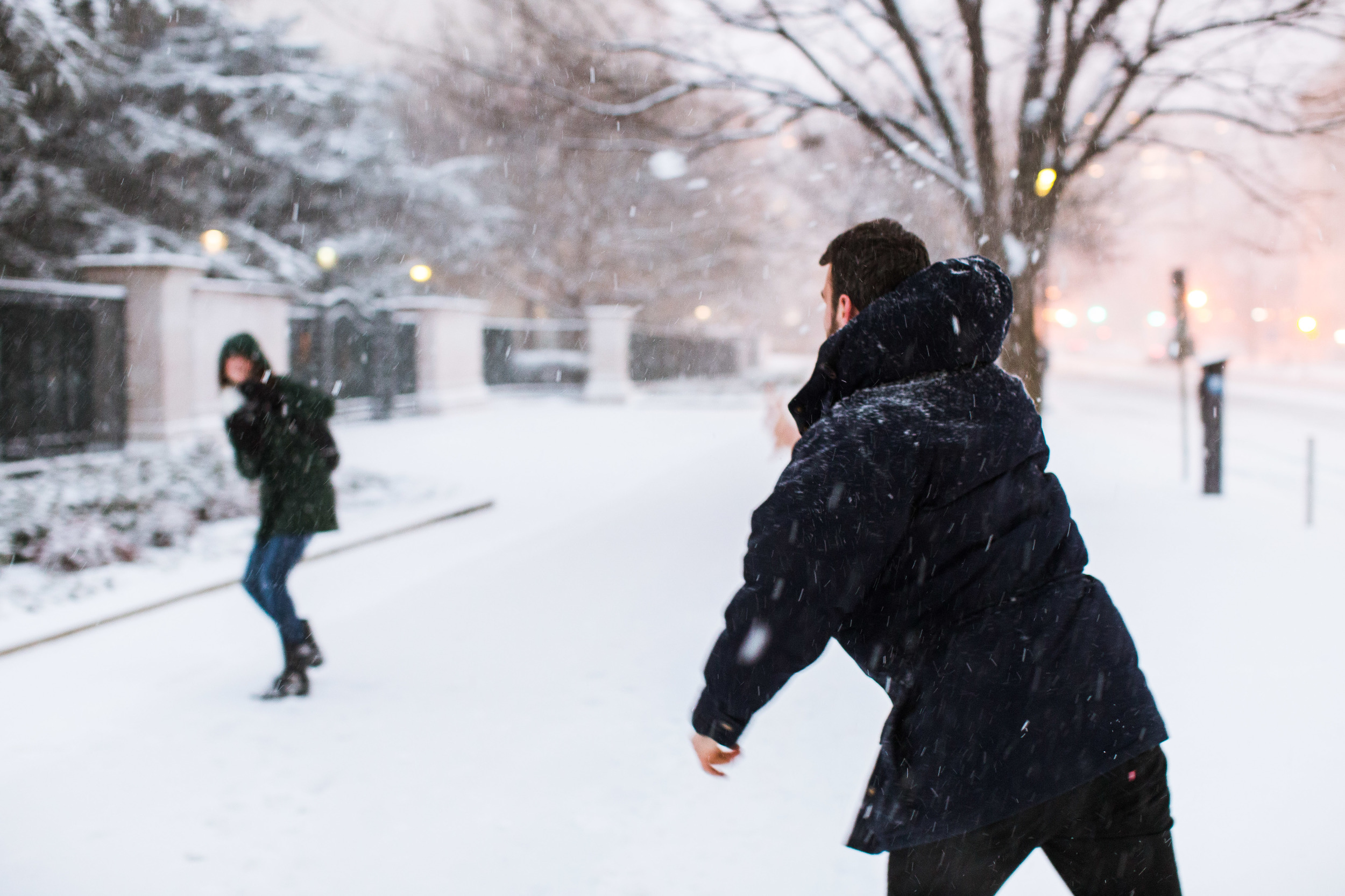  These lovely people moved here from California. This was their first blizzard but judging from his throwing technique, not their first snowball fight.&nbsp; 