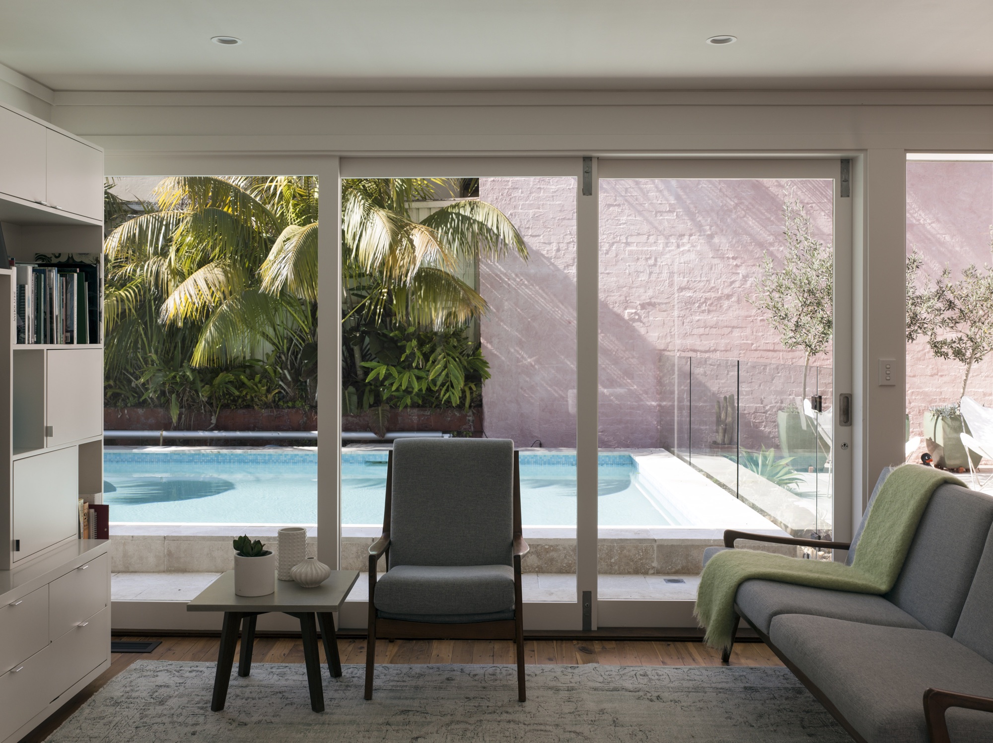 The ground floor plan was clarified to create clear zones for living and relaxing. Sneaking in a new bathroom, laundry, study and larger kitchen, whilst providing clear access to the pool courtyards and new roof terrace.