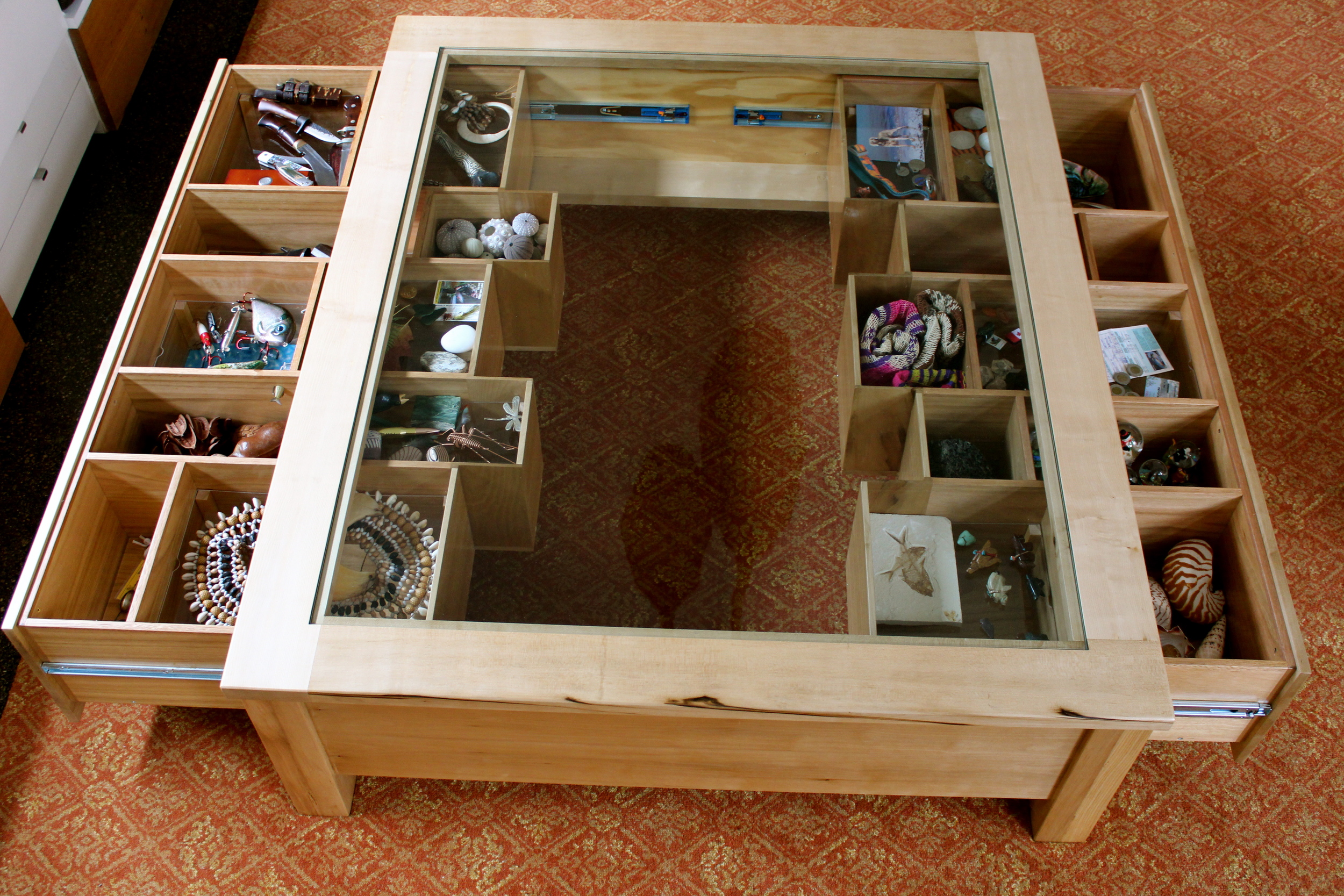 The intricate drawers of the Memento Sassafras Coffee Table.