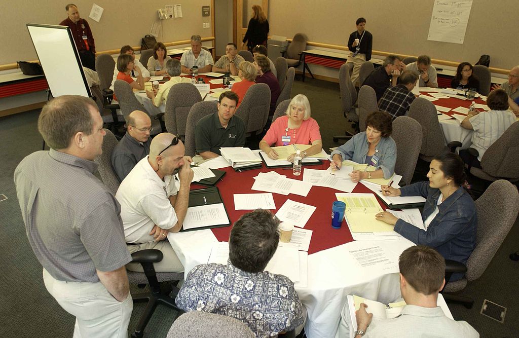 Image: http://upload.wikimedia.org/wikipedia/commons/thumb/8/81/Small_groups_working_at_tables_during_summit.jpg/1024px-Small_groups_working_at_tables_during_summit.jpg