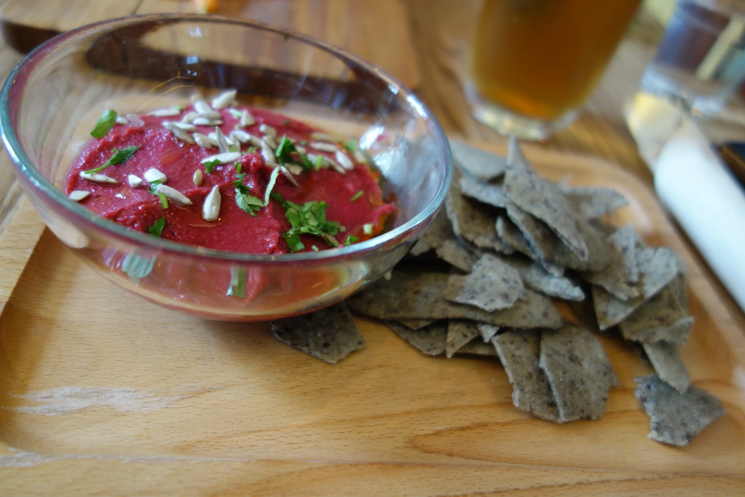 Looks like tomato paste but it's hummus, not enough crisps