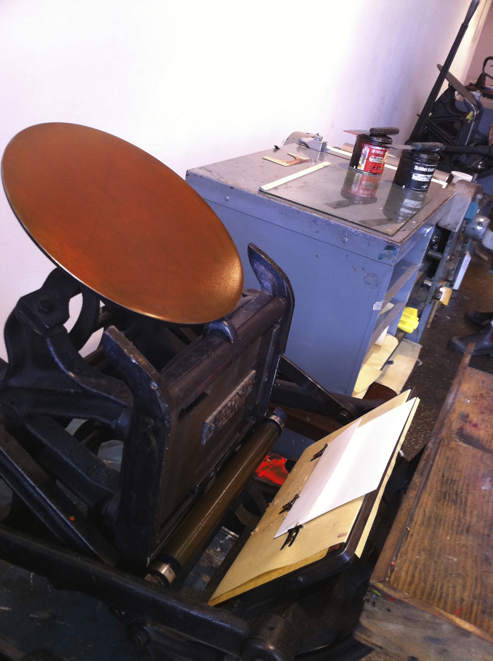  Here is the C&amp;P Pilot platen letterpress at The Arm letterpress collective in Williamsburg on which we have printed our business cards, as well as one-off broadsides, mini coinsides and other projects. 