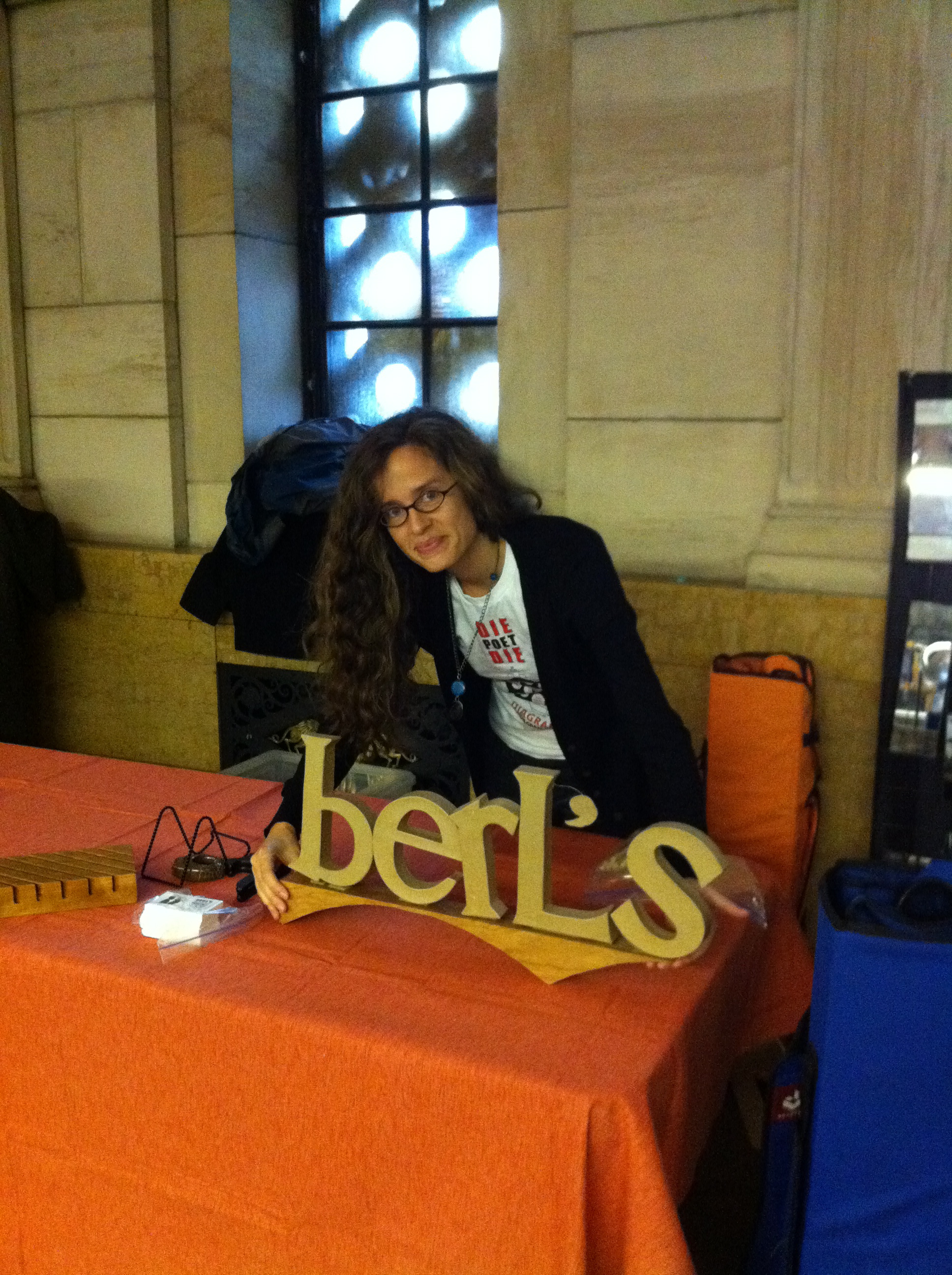  Day One! Farrah brandishes our first Berl's sign, designed by Jared's father.&nbsp; 