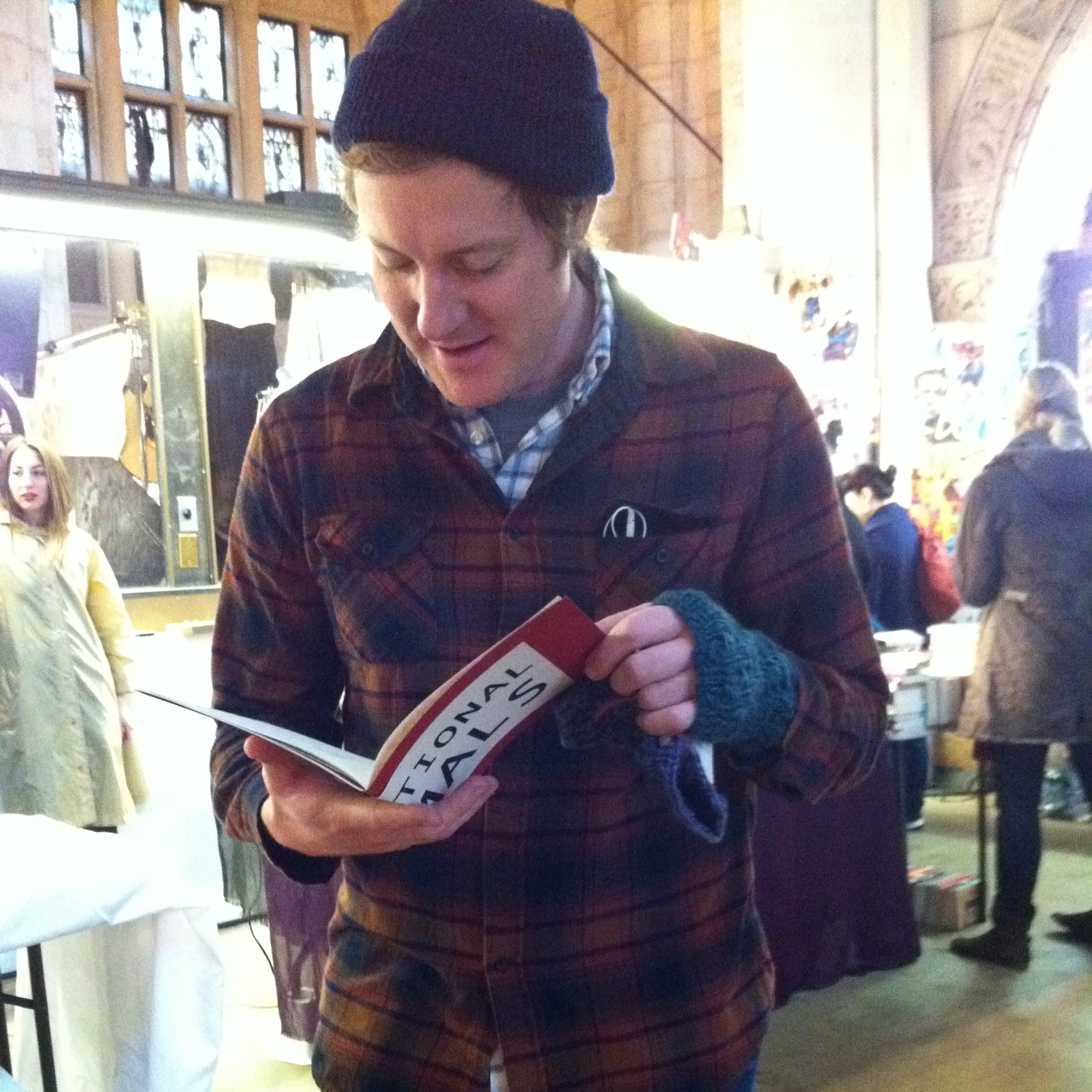  Our very first customer was poet Zachary Schomburg, here perusing (IR)RATIONAL ANIMALS by Steven Karl from Flying Guillotine Press. 