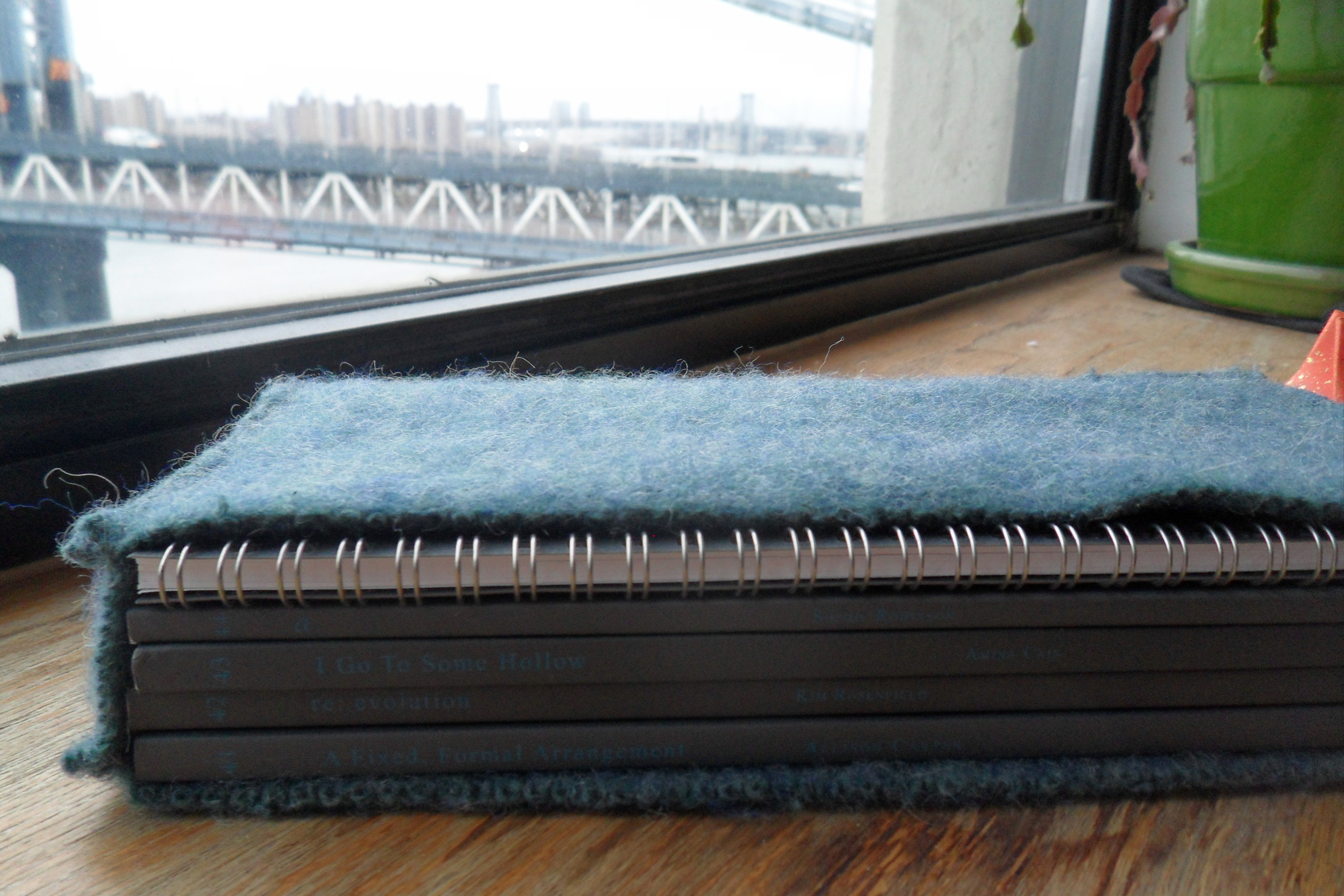  A one of a kind felted book sleeve for Les Figues Press's TrenchArt Series: TRACER 