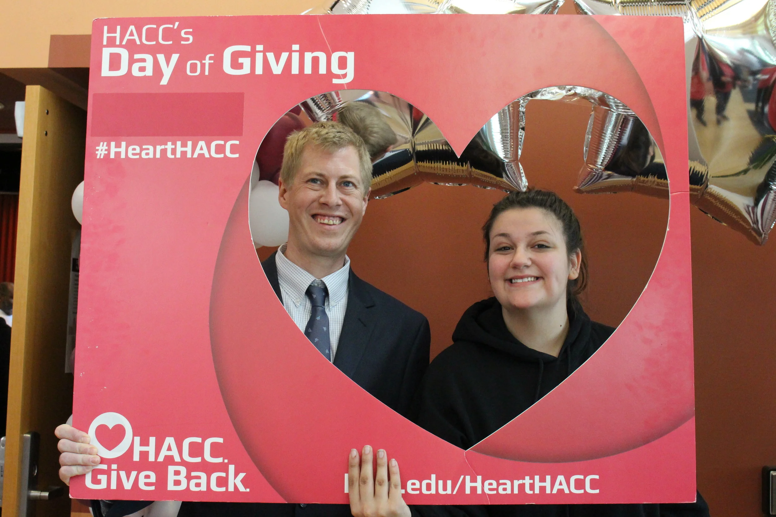 M&D Architect Ryan Shank, AIA, and this year’s scholarship winner pose for a picture during HACC’s annual Day of Giving this year.