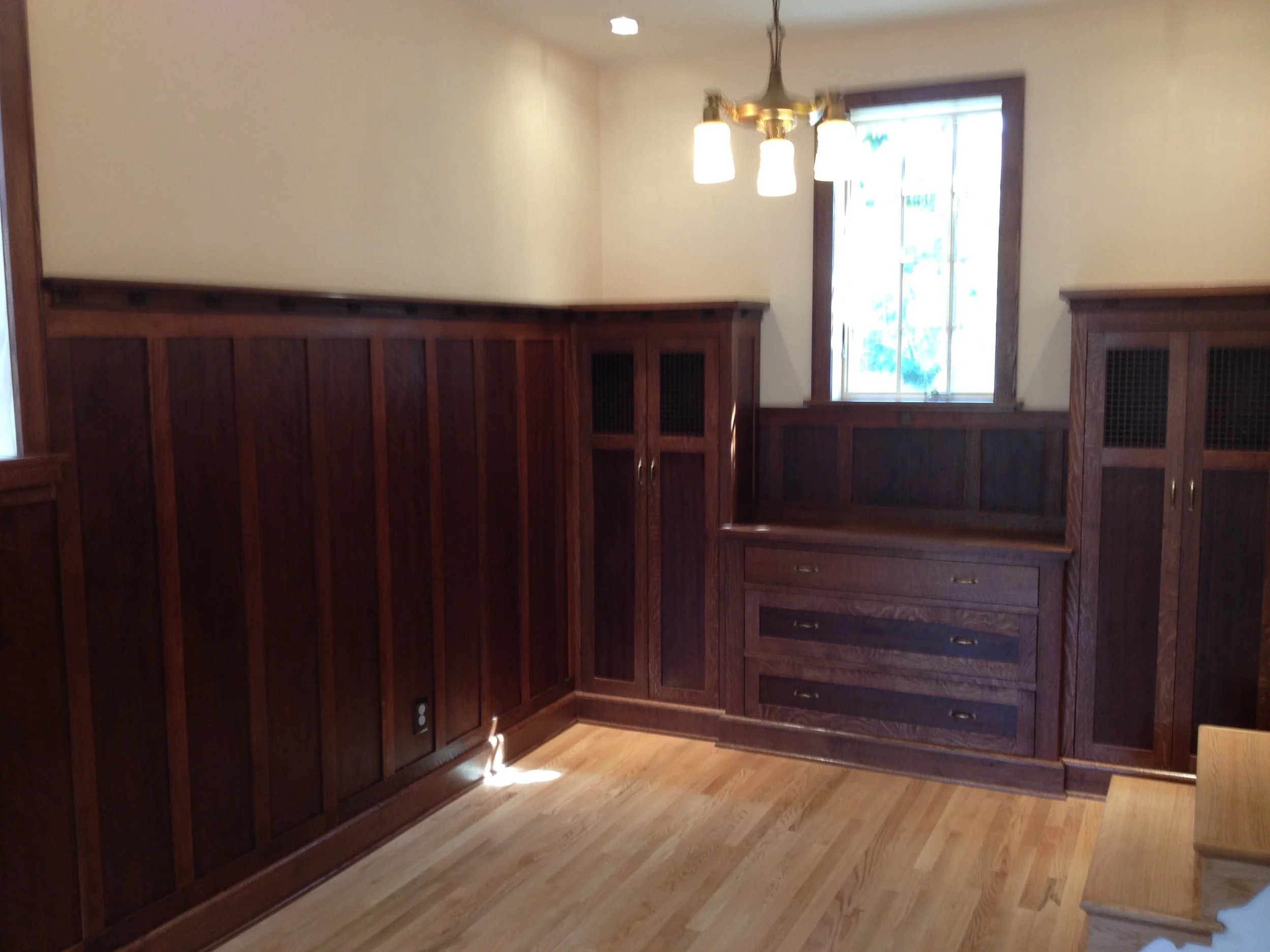 Reclaimed quartered white oak. Buffett and tall cabinets.