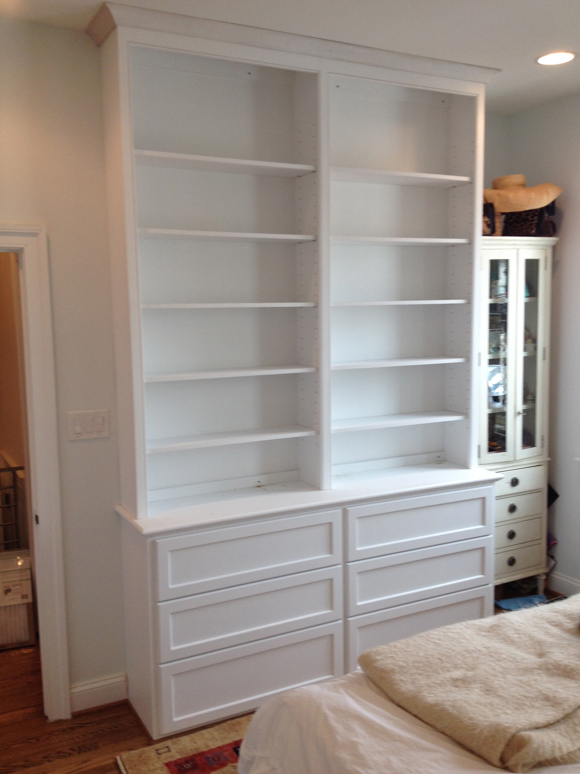 Small foot print with lots of drawers and shelving.