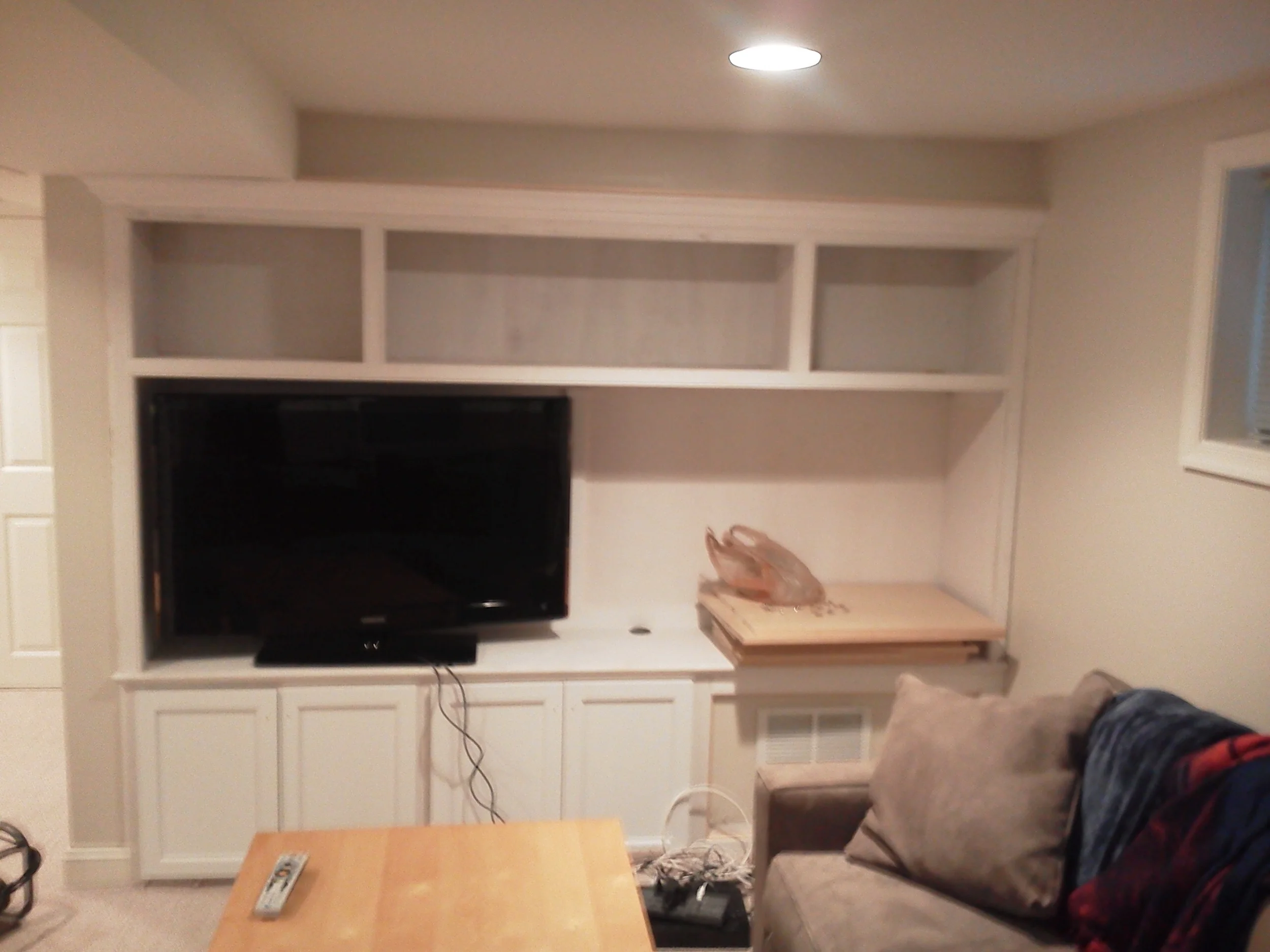 Unpainted unit. Odd space, cleaned it up.