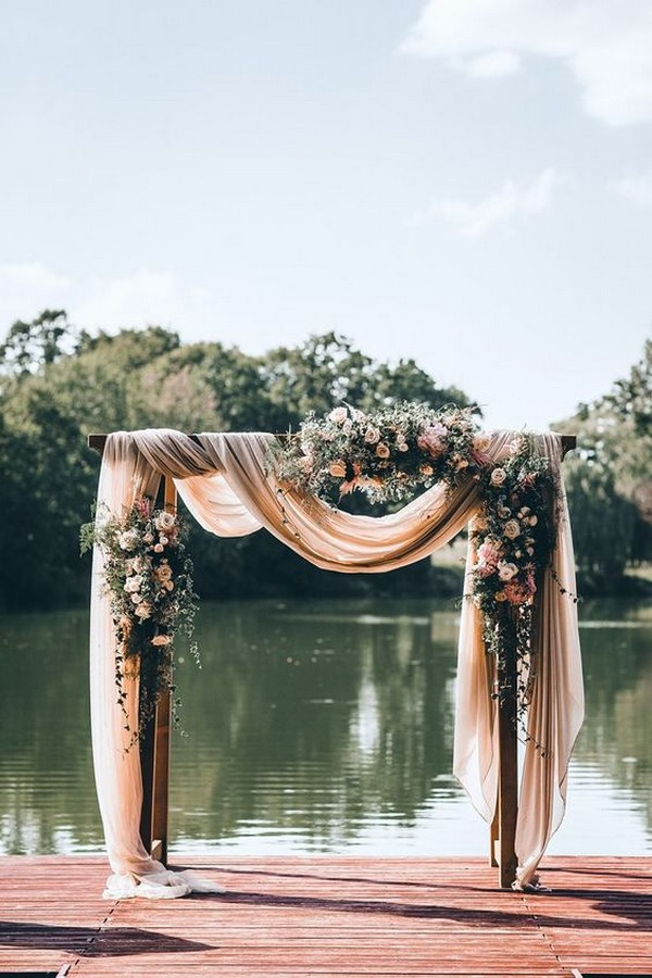romantic-summer-wedding-arch-ideas-with-blush-pink-fabric.png