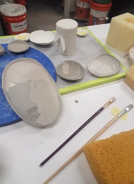 glazed works ready for the kiln
