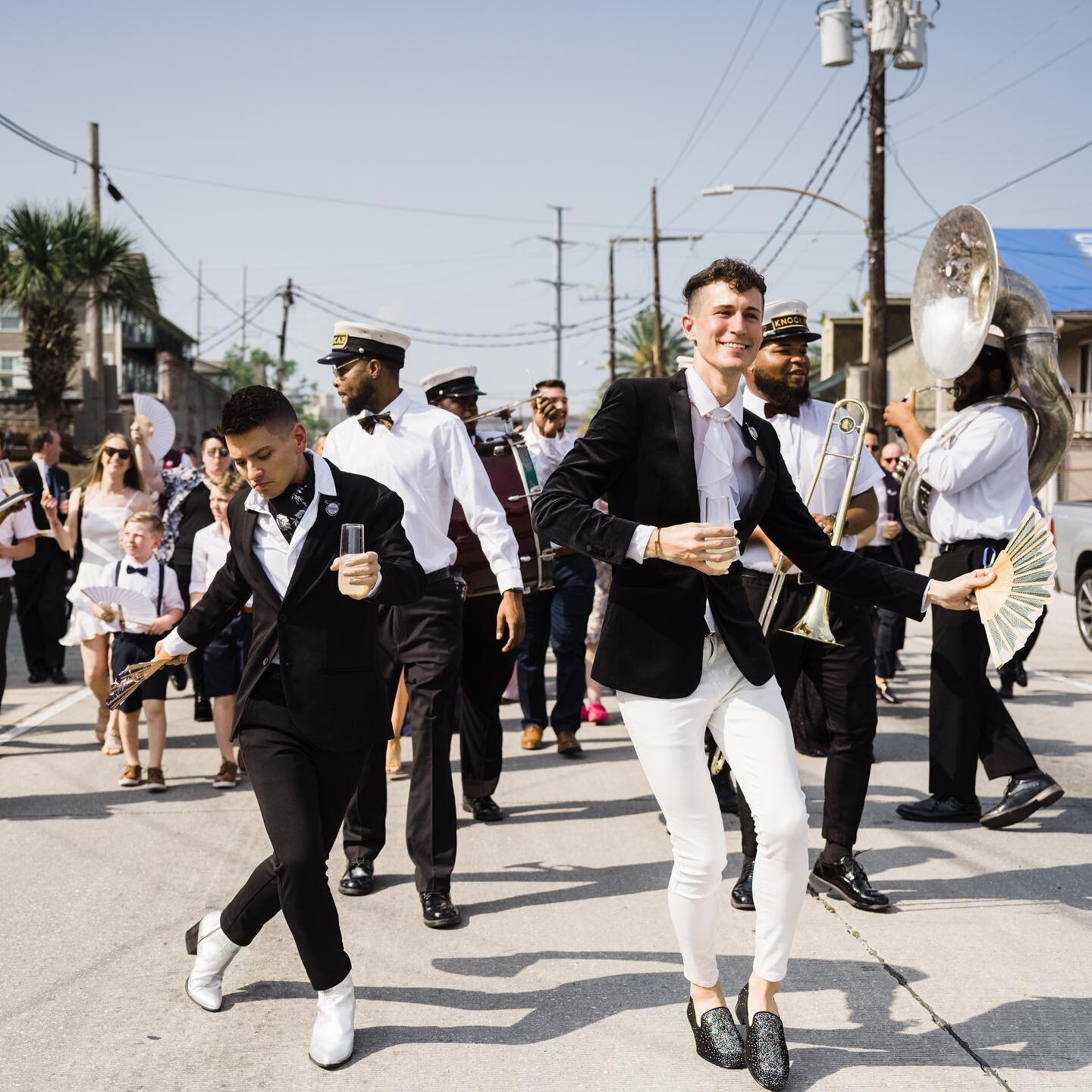 Just two cuties who got married second lining down the New Orleans streets ⚜️