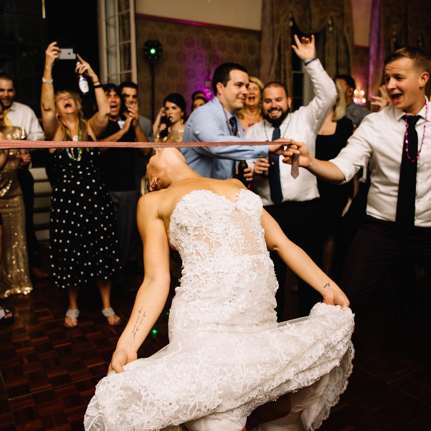 I always encourage a good Wedding Limbo so I stole a tie from a guest and made it happen 💃