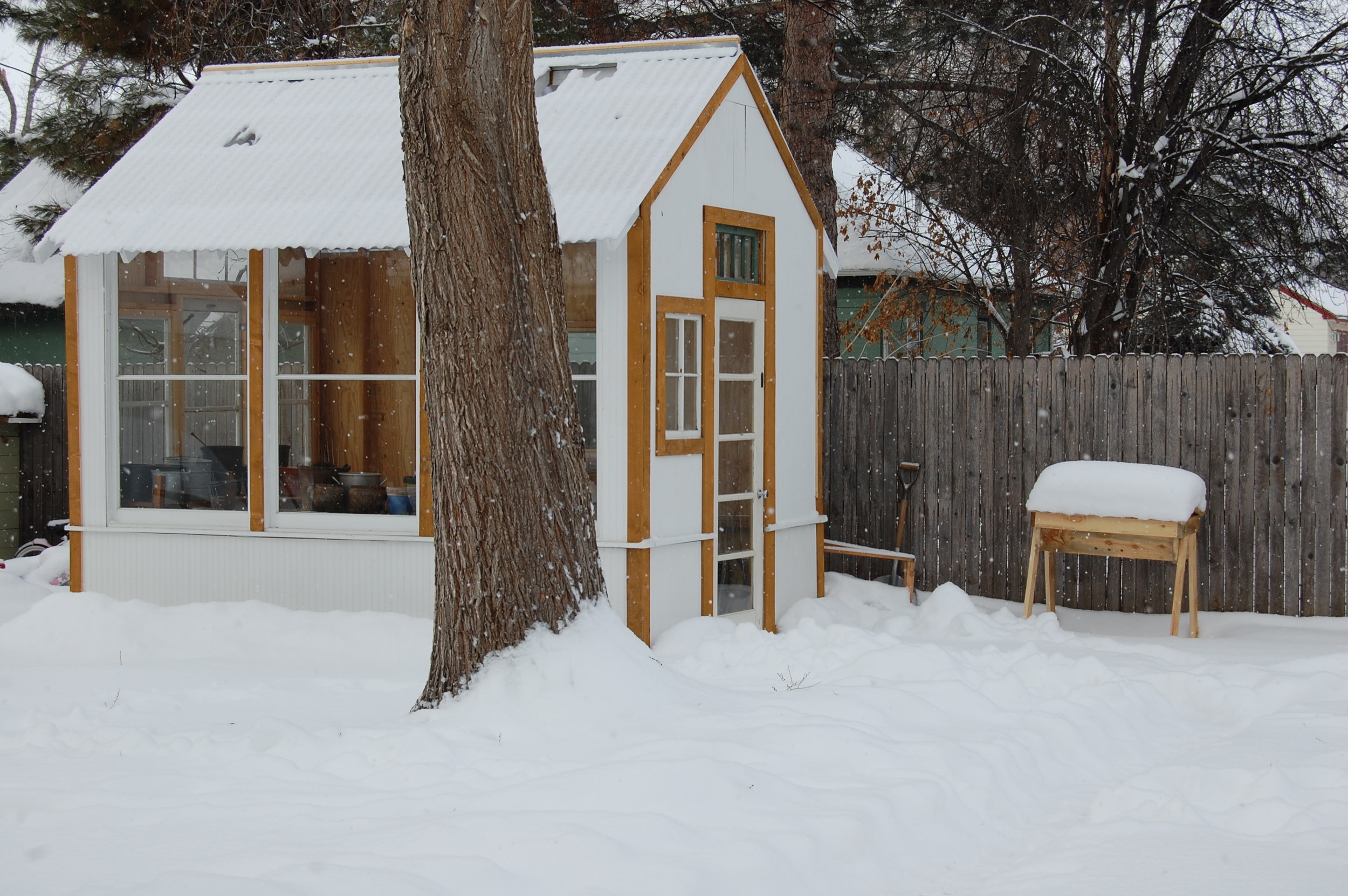 Progress by end of 2011 - with hole in the roof from a heavy snow that sent a branch through.